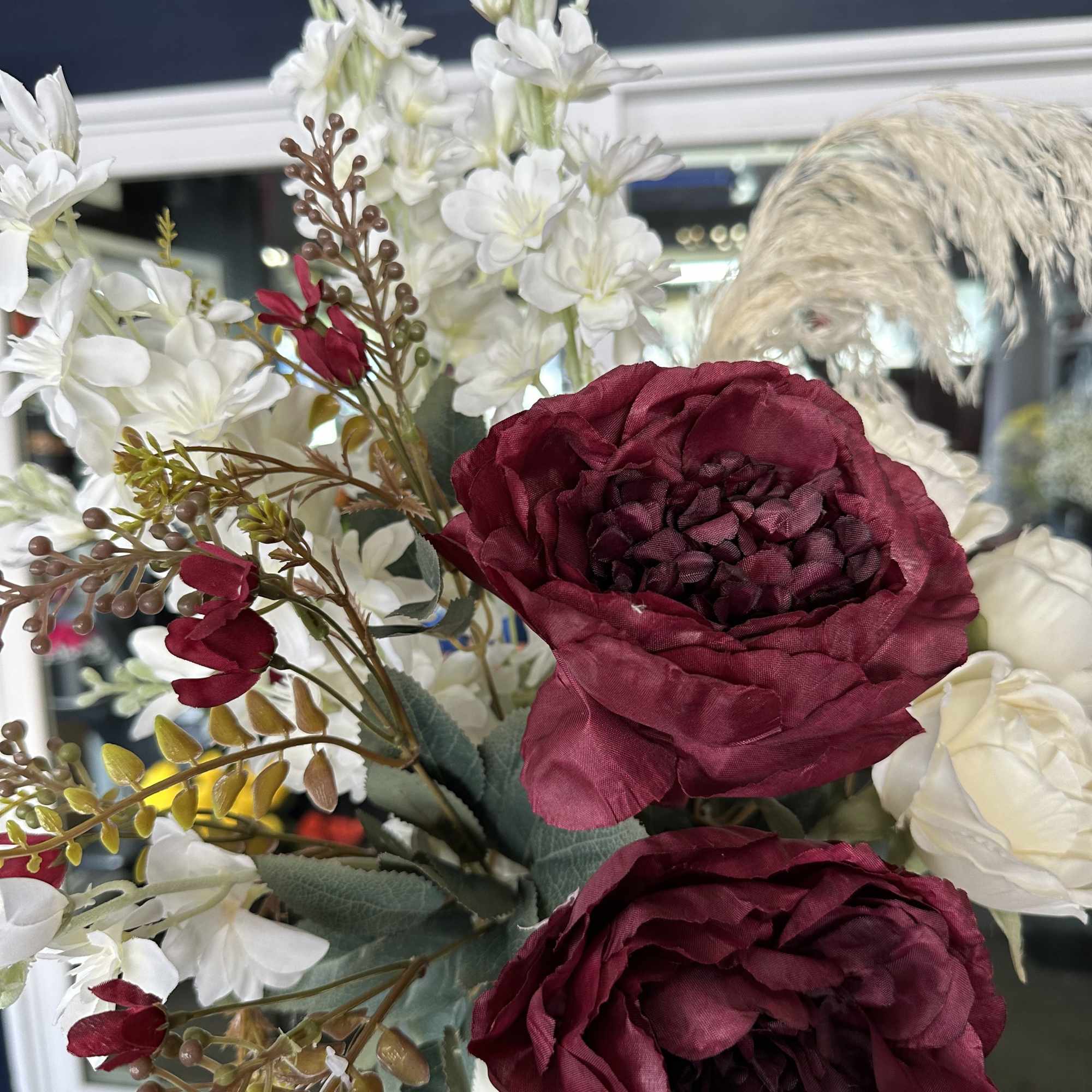 Unique piece! 30&ldquo; tall artificials hand arranged by our designers. Order before