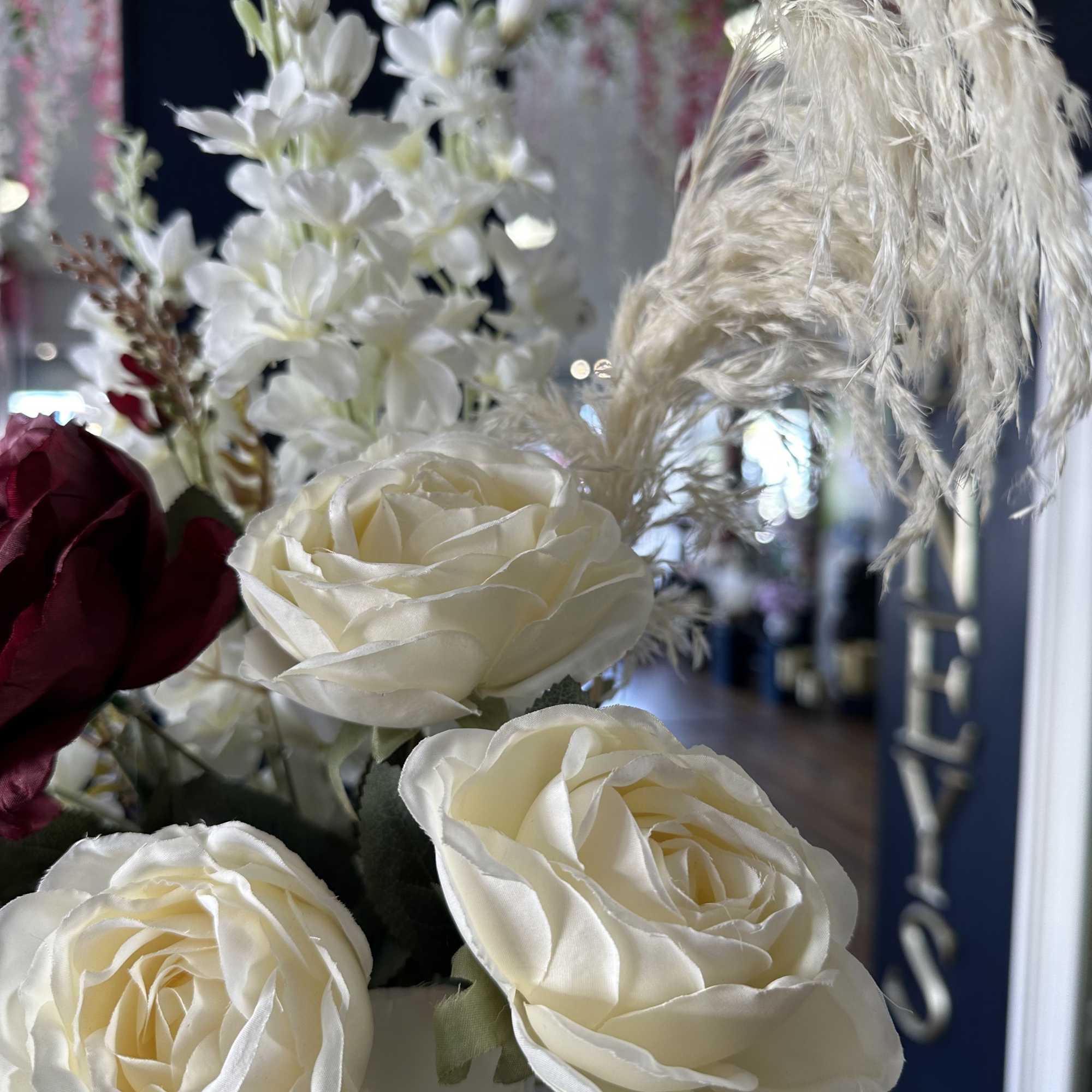 Unique piece! 30&ldquo; tall artificials hand arranged by our designers. Order before