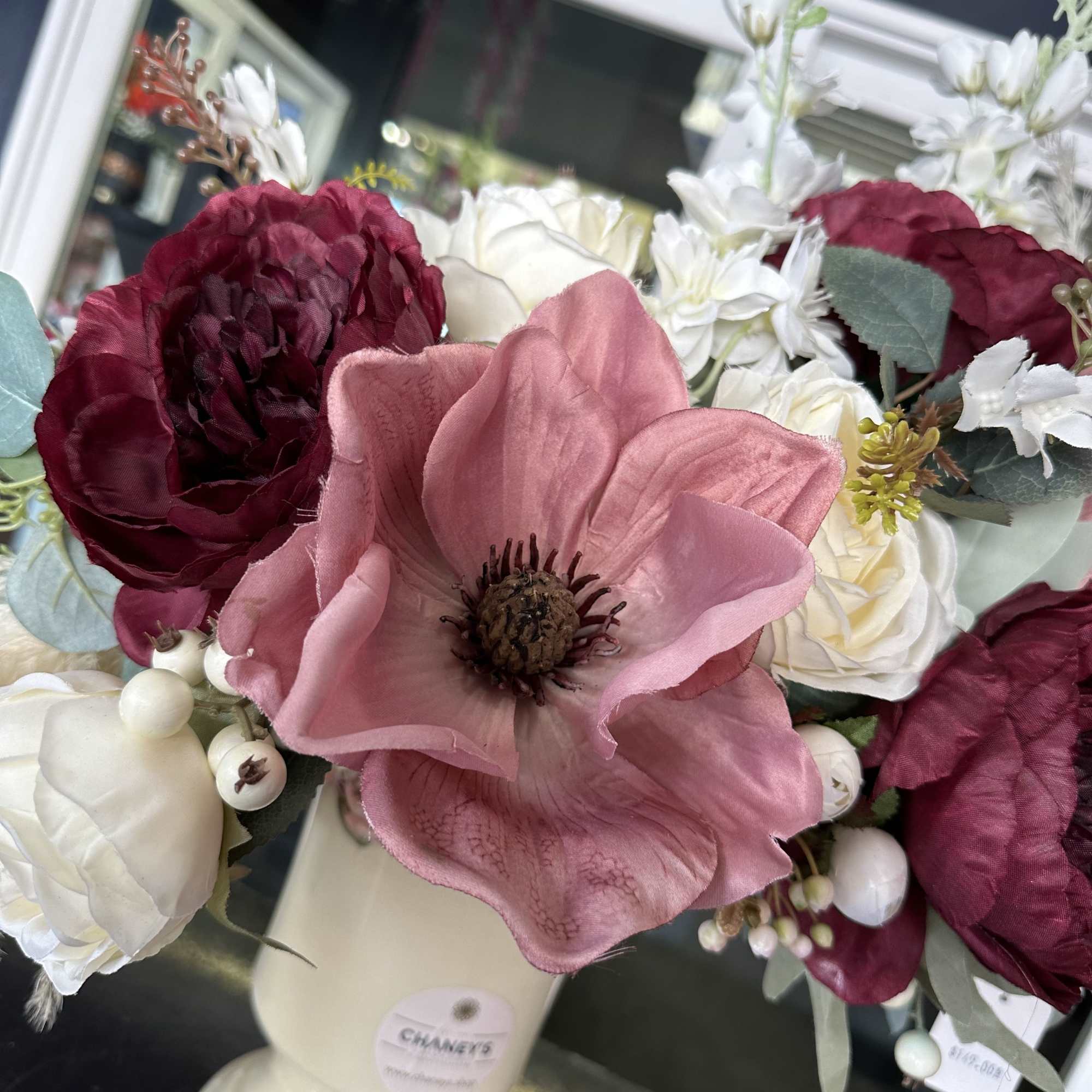 Unique piece! 25&quot; tall artificials hand arranged by our designers. Order before