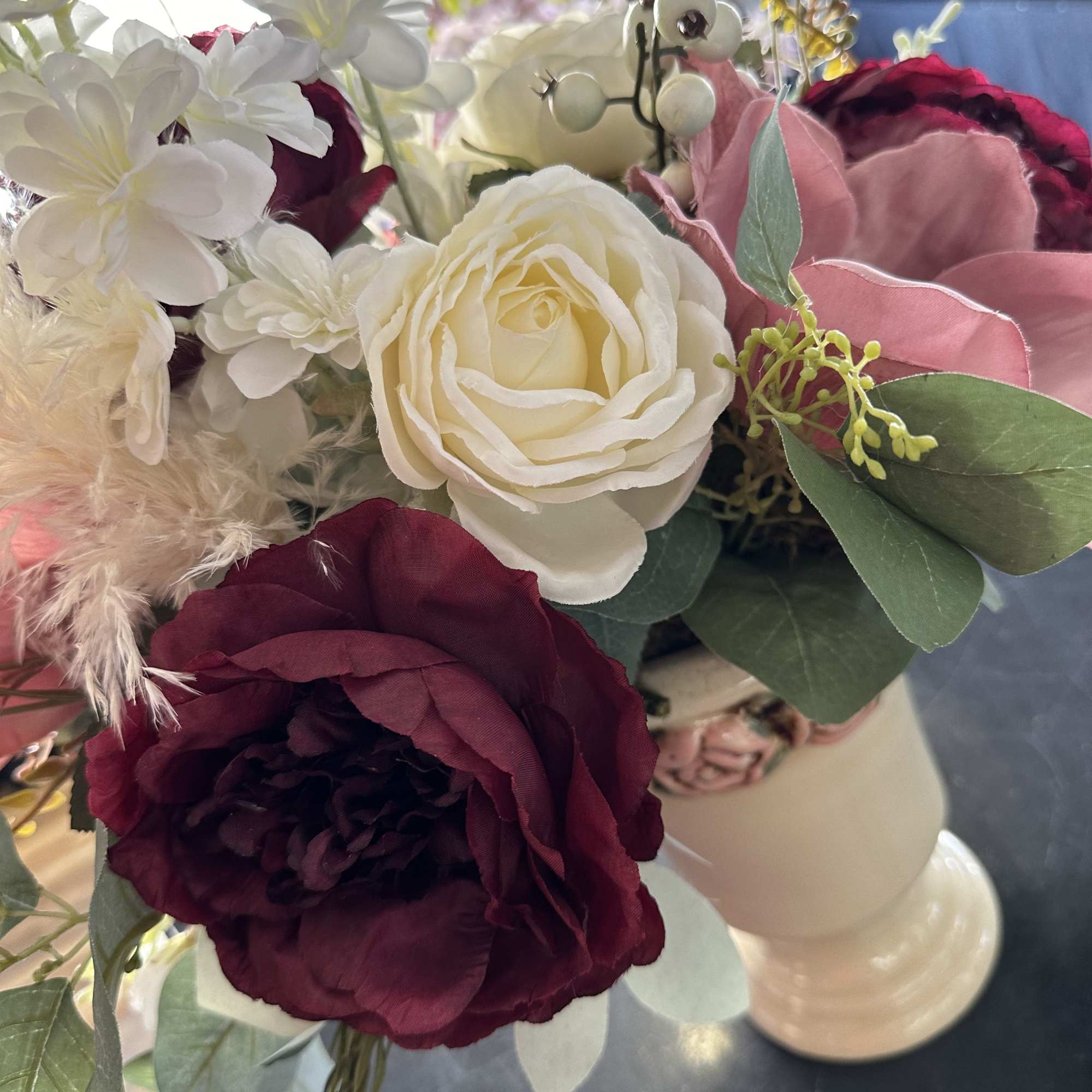 Unique piece! 25&quot; tall artificials hand arranged by our designers. Order before