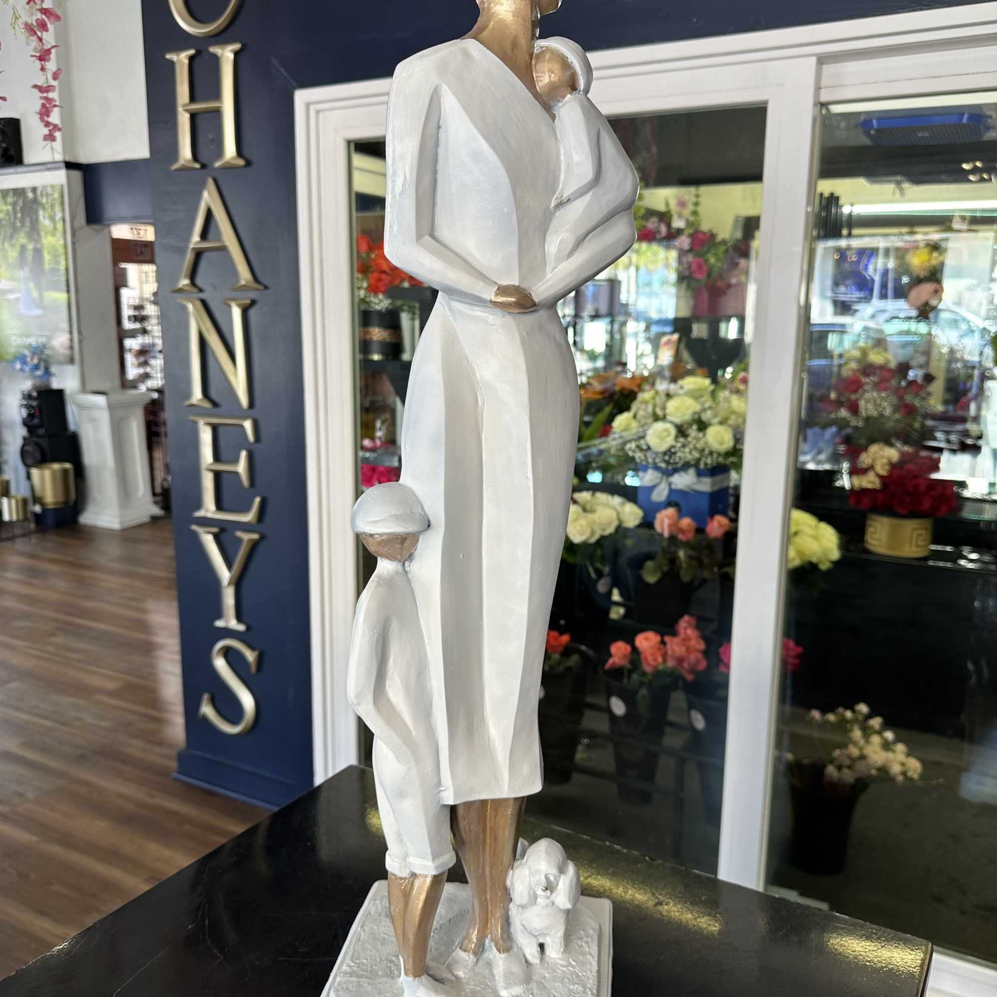 Unique piece! 30&ldquo; tall sculpture of a classy woman, a boy, a