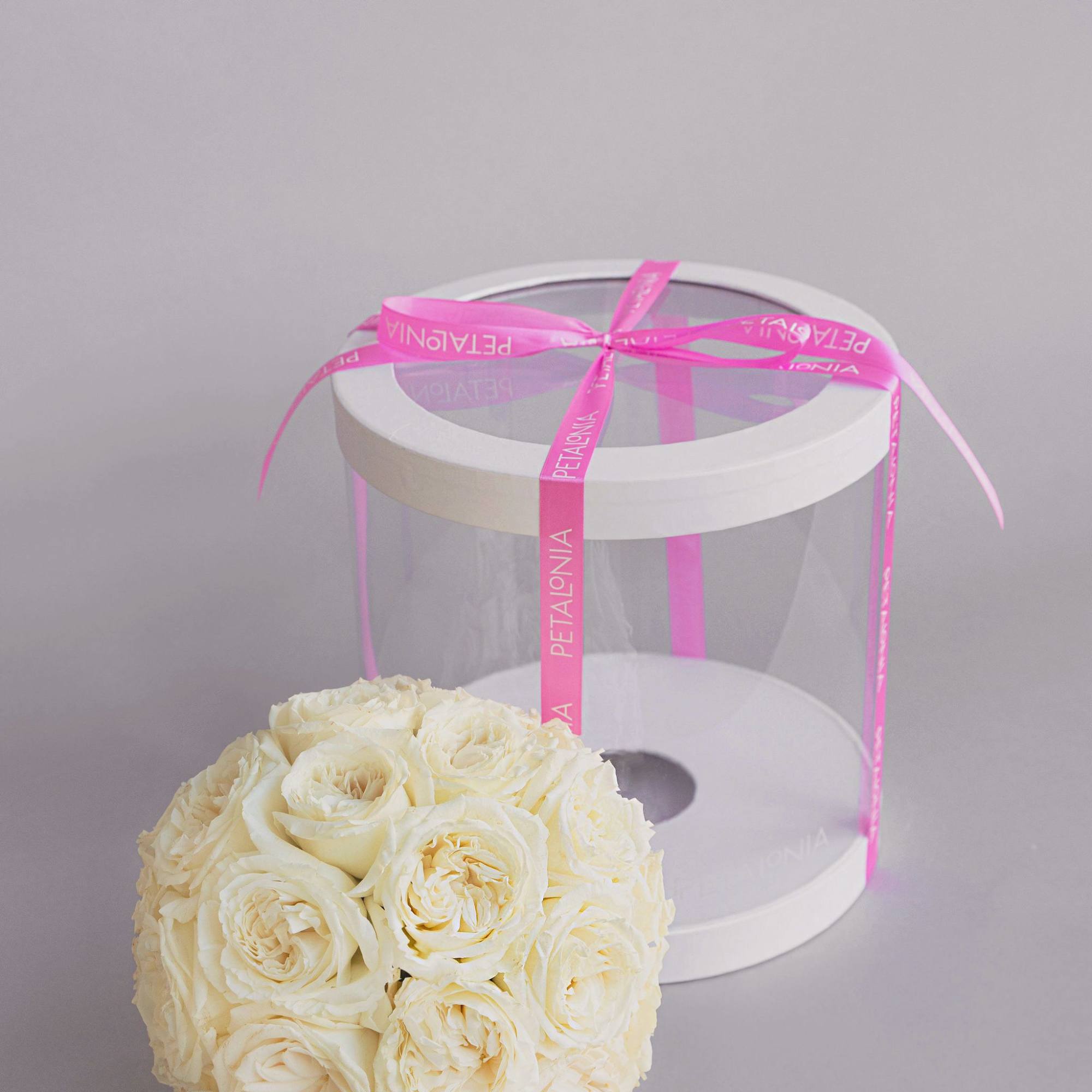 A gift and flower in one, this exquisite spherical arrangement of mini