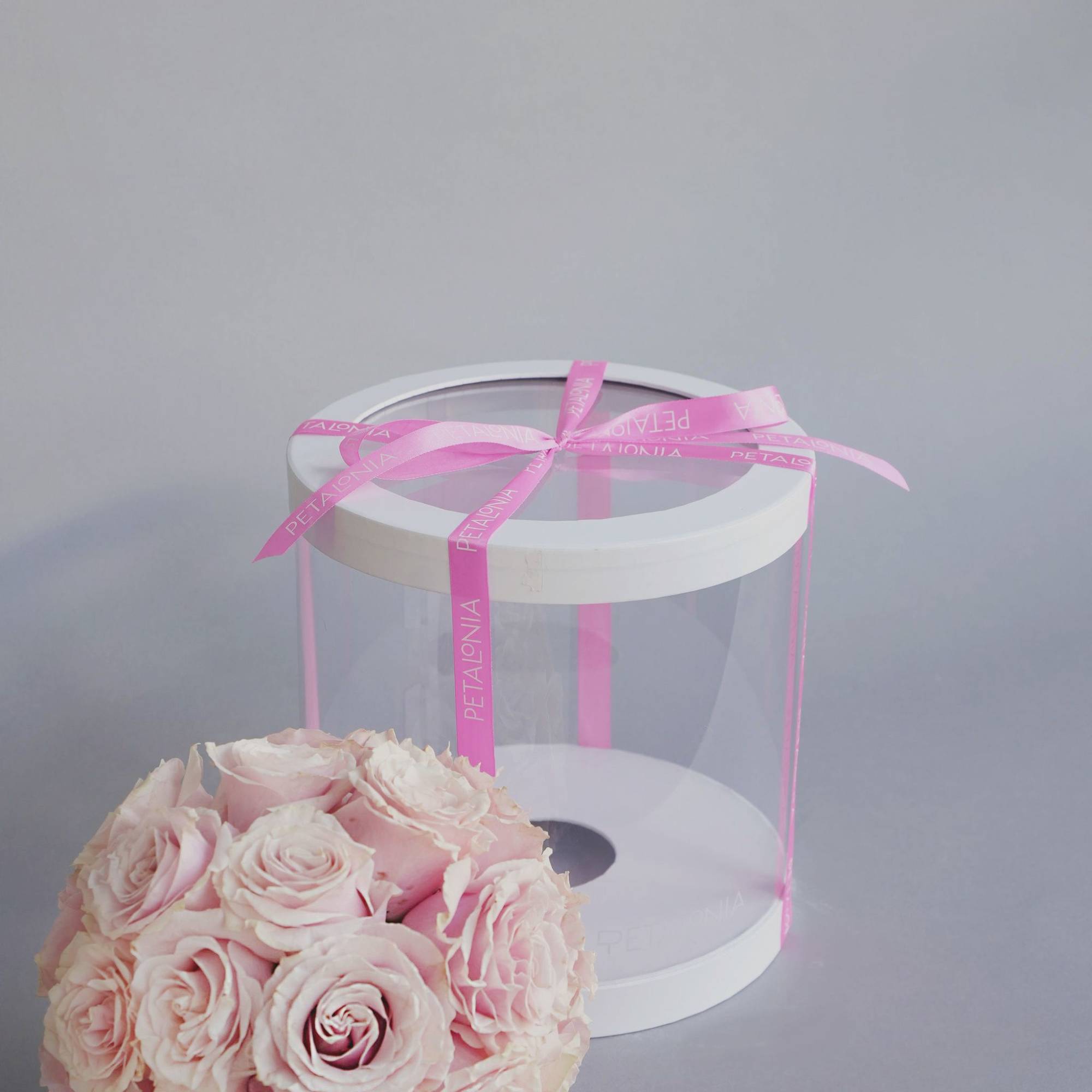 Experience timeless beauty with our preserved rose arrangement, thoughtfully presented in a