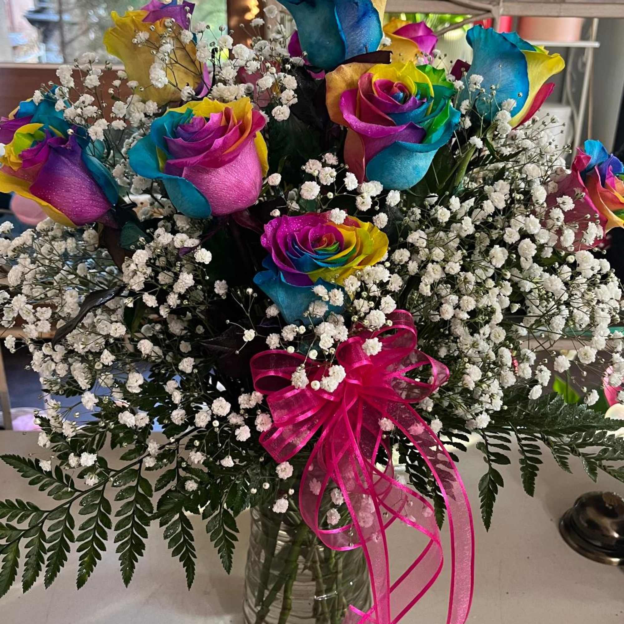 Rainbow roses in Victorville, CA | Flowers by Gina Jones