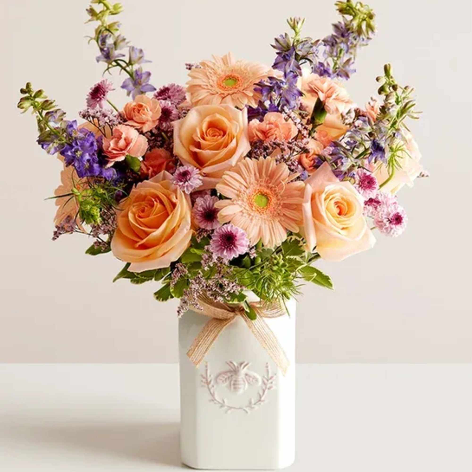 Get them buzzing with our charming bouquet! A garden-fresh gathering of blooms