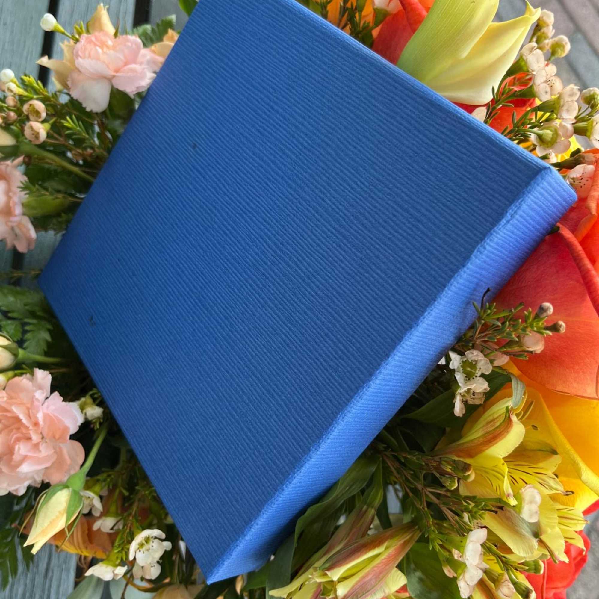 Bright and cheerful colors in a blue floral box. A new design Bright and cheerful colors in a blue floral box. A new design