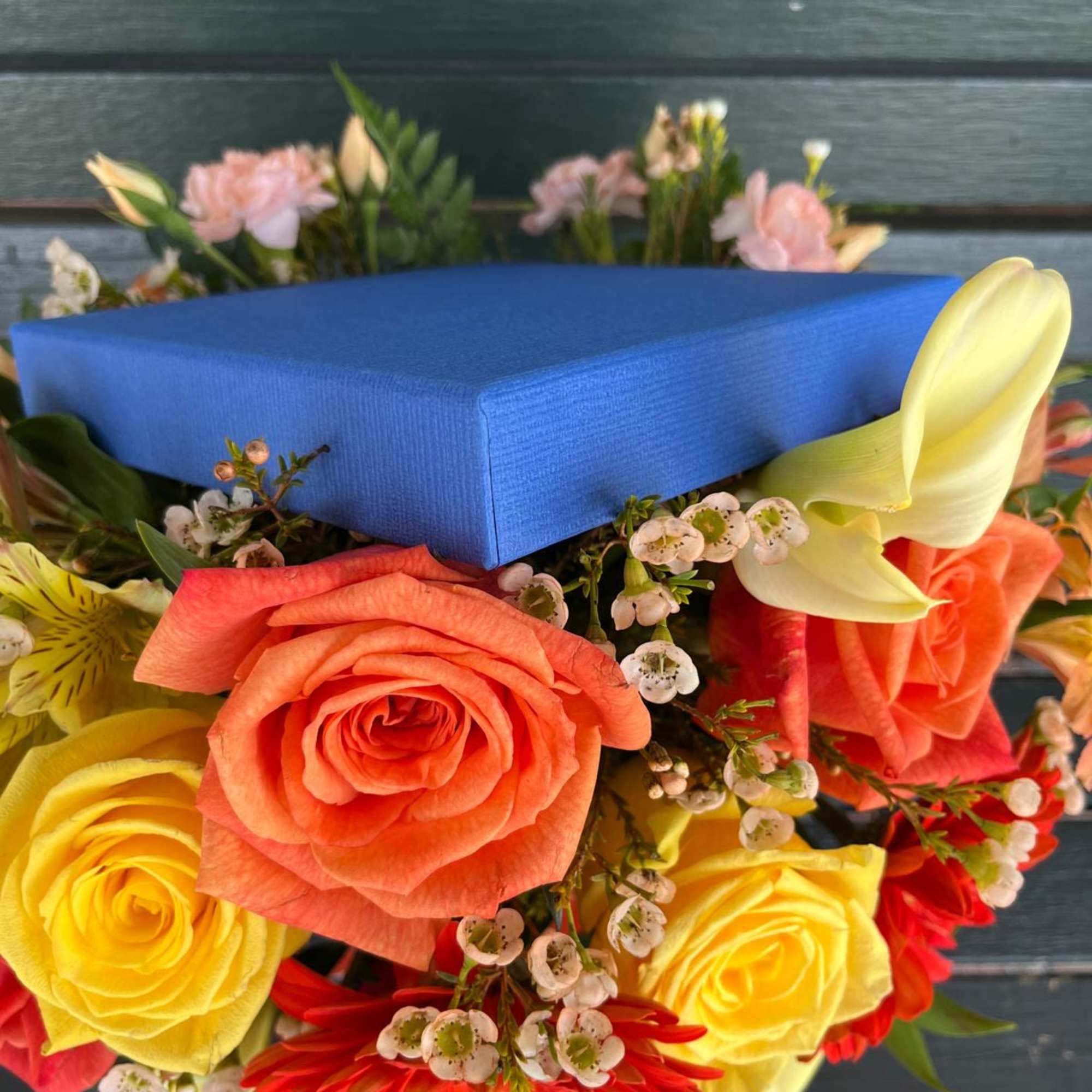 Bright and cheerful colors in a blue floral box. A new design Bright and cheerful colors in a blue floral box. A new design