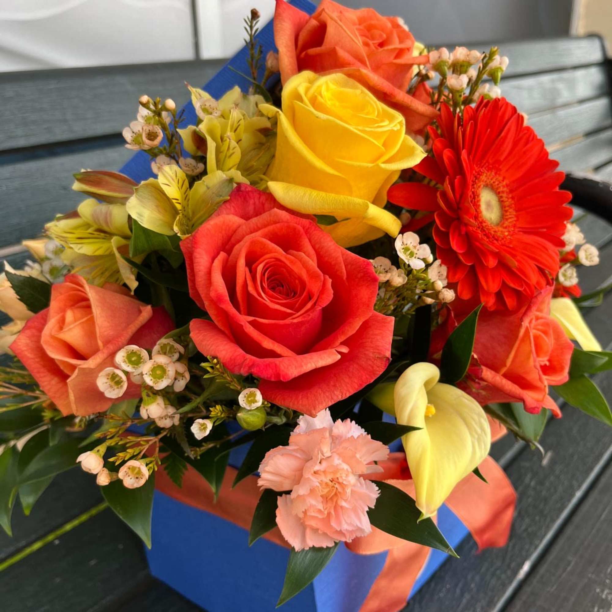 Bright and cheerful colors in a blue floral box. A new design Bright and cheerful colors in a blue floral box. A new design