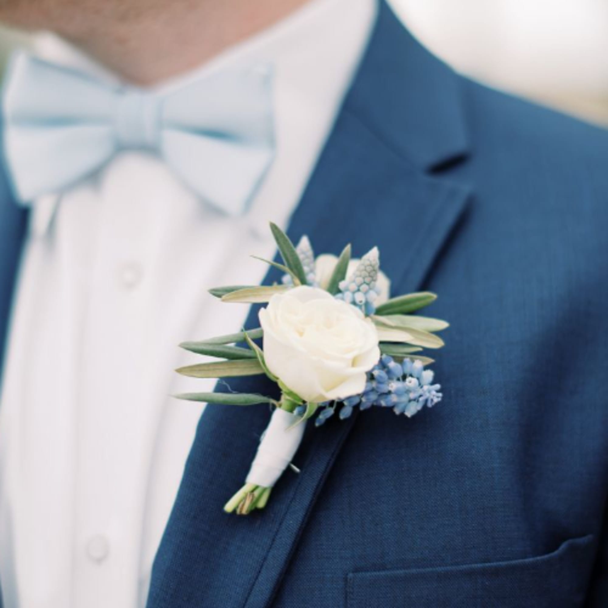 Signature boutonni&egrave;res perfect for weddings and special events in client&#039;s preferred color