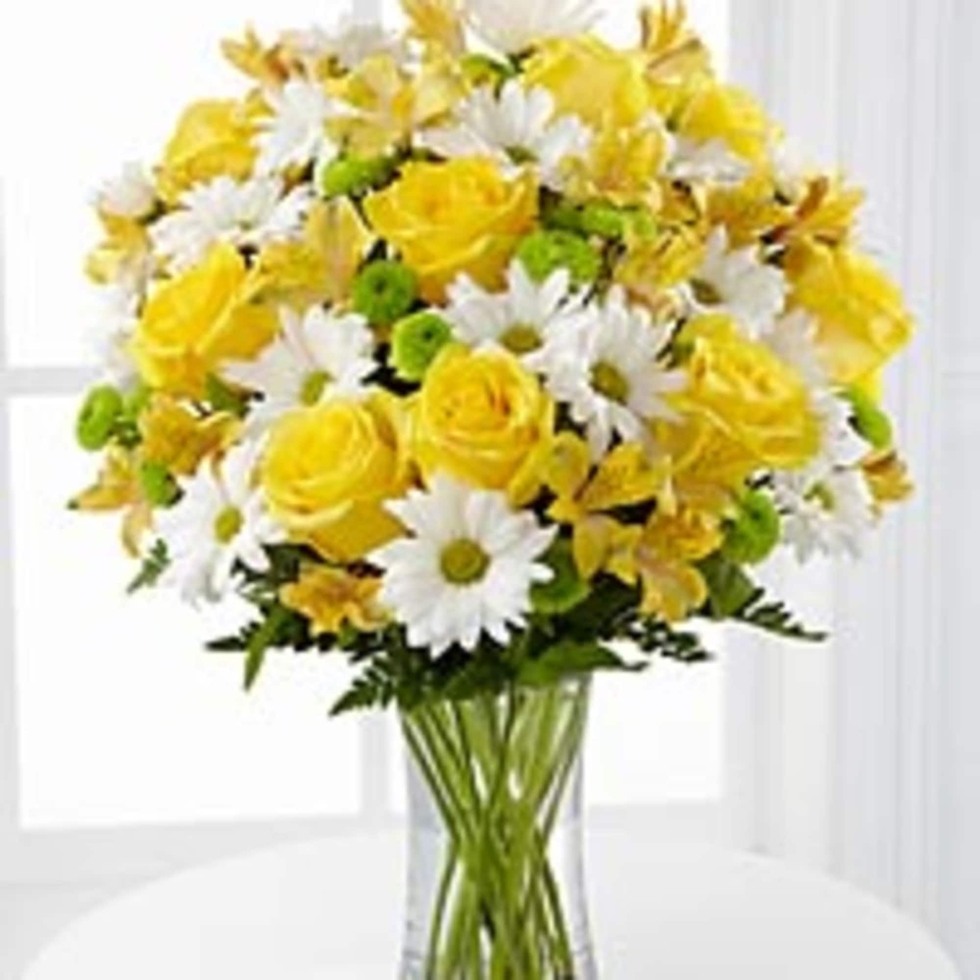 A beautiful sunny arrangement of yellow roses and white daisies A beautiful sunny arrangement of yellow roses and white daisies