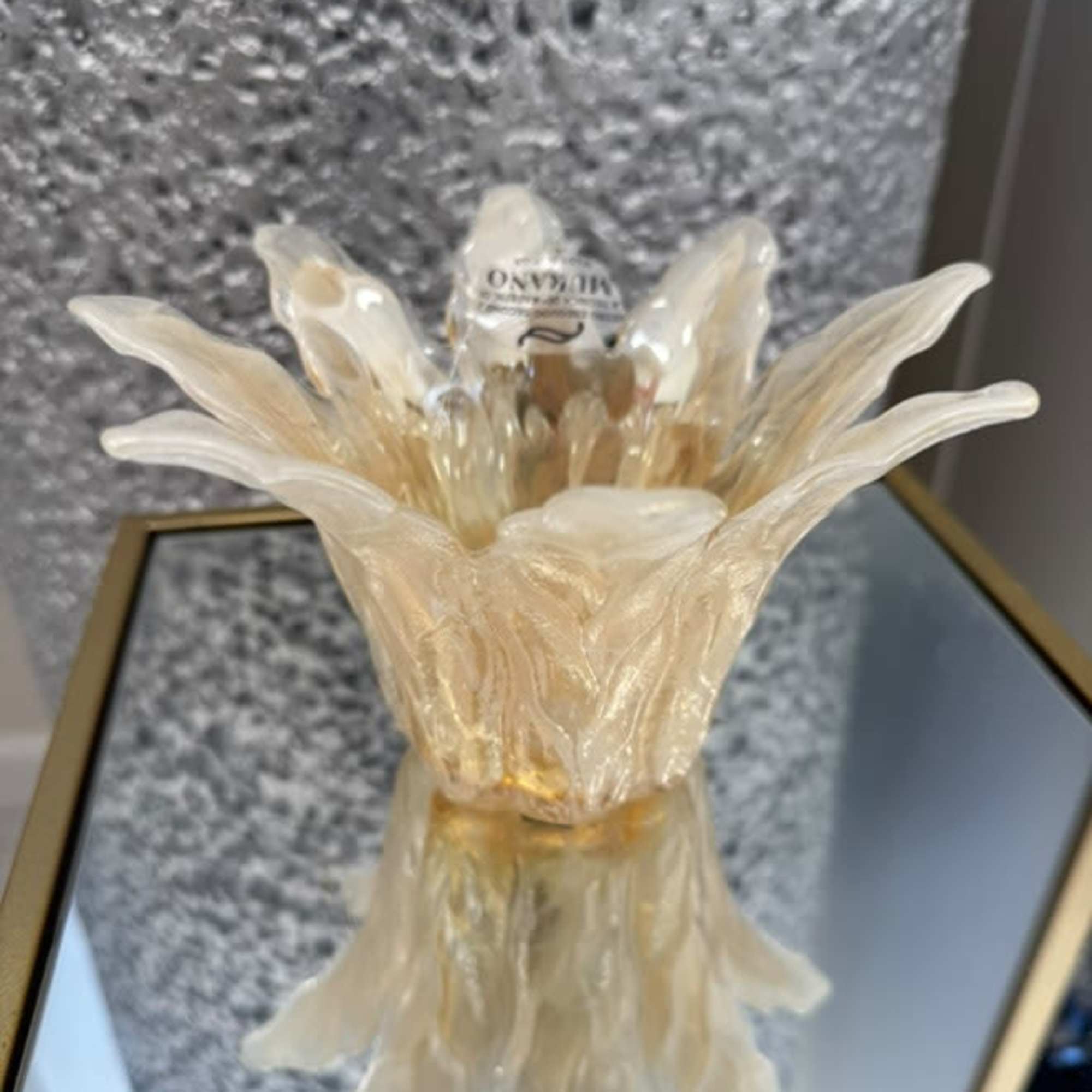  A radiant centerpiece shaped like an open blossom, featuring warm yellow