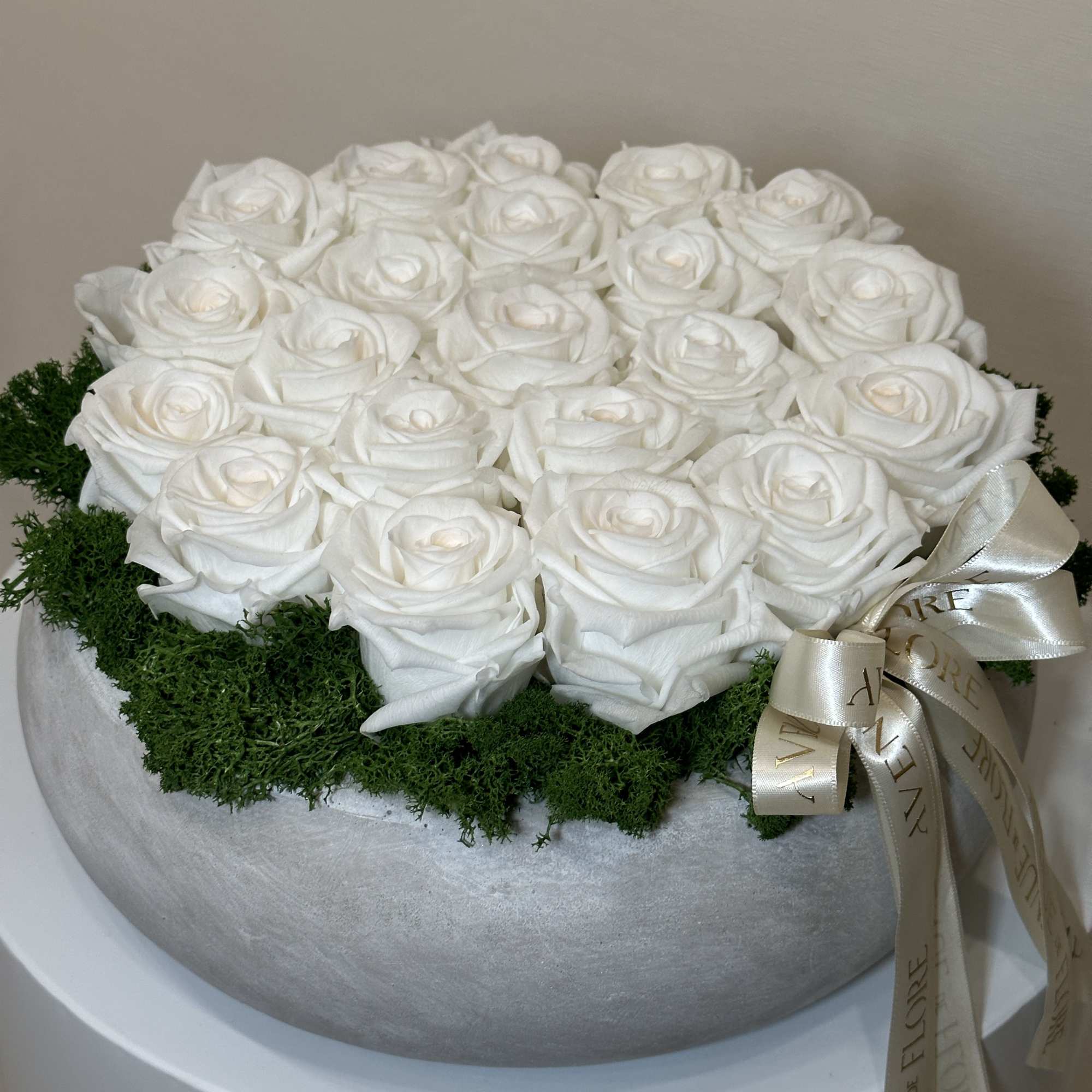 Indulge in the everlasting beauty of our White Whisper arrangement, presented in