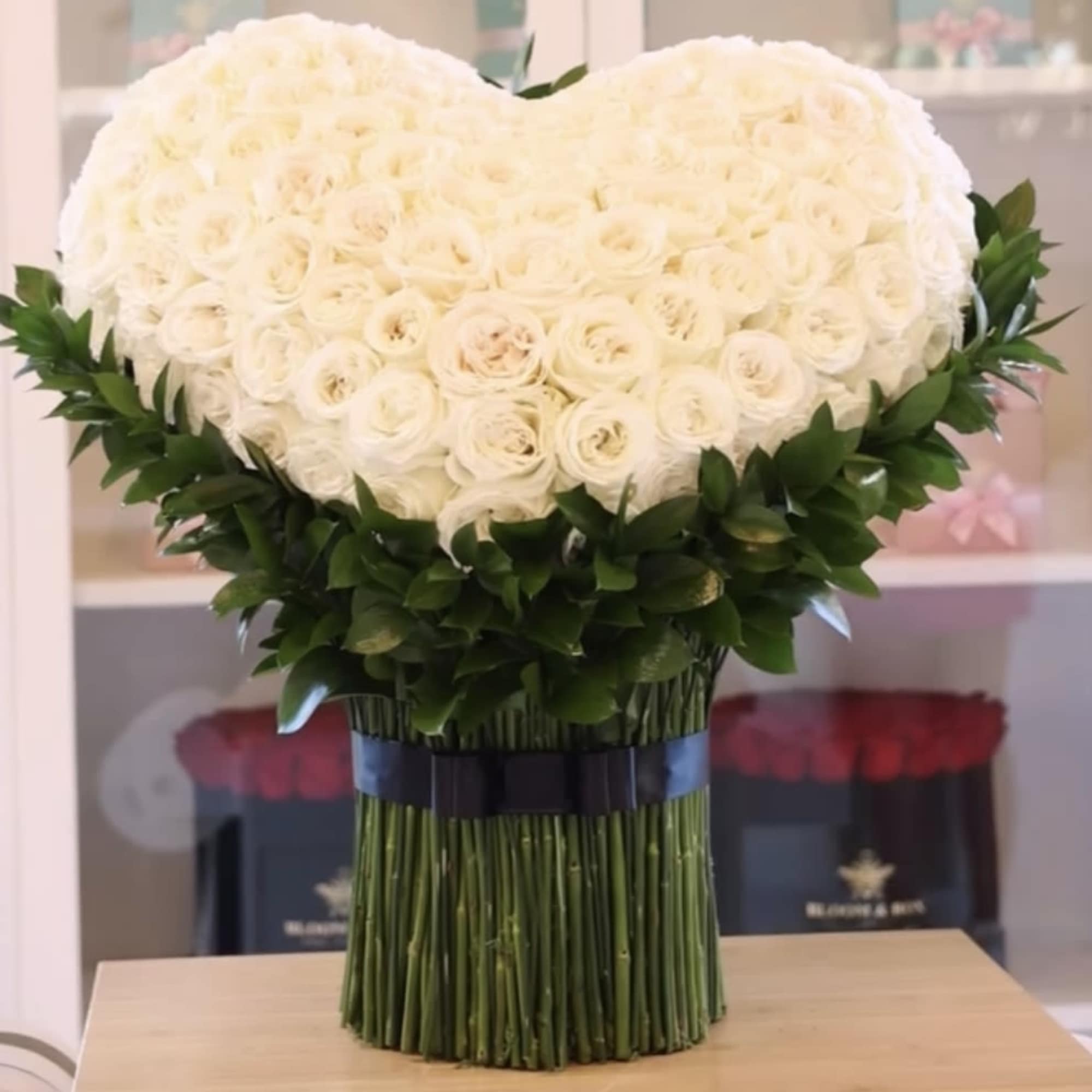 White Rose heart, this is an over the top type of arrangement