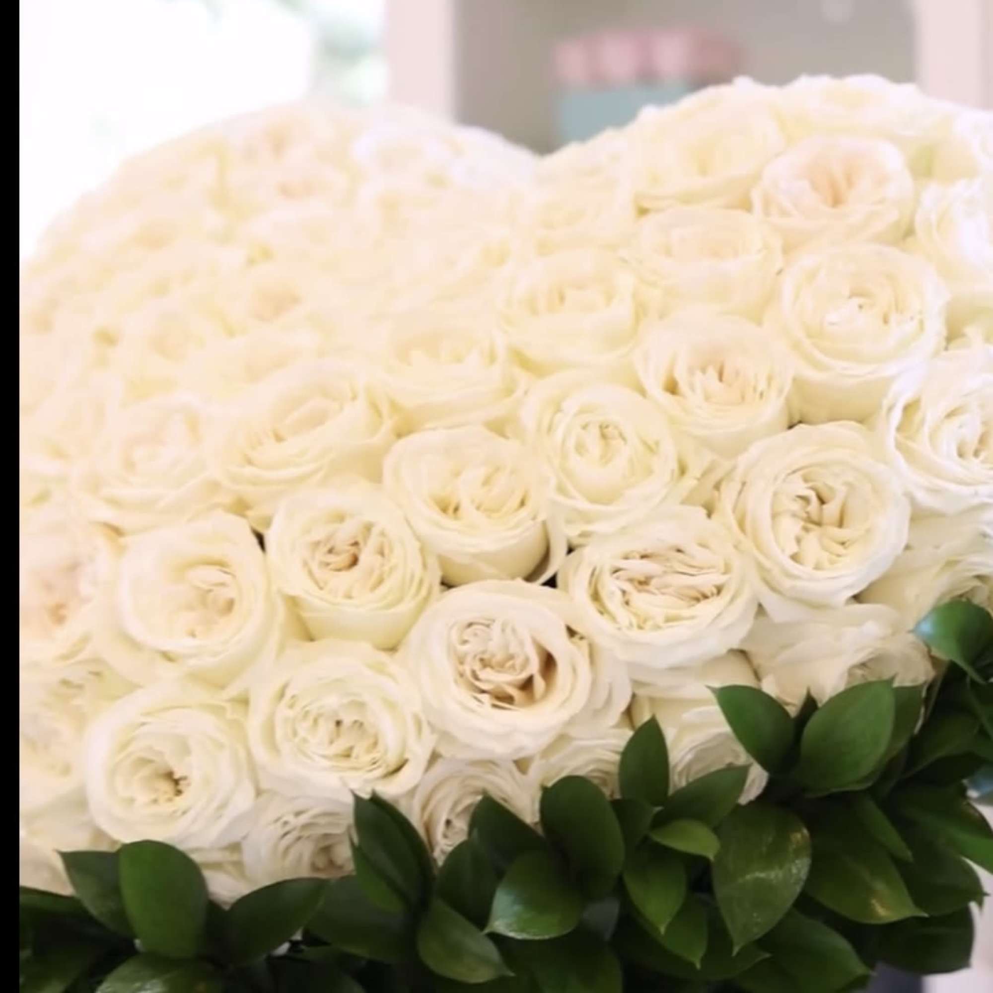 White Rose heart, this is an over the top type of arrangement
