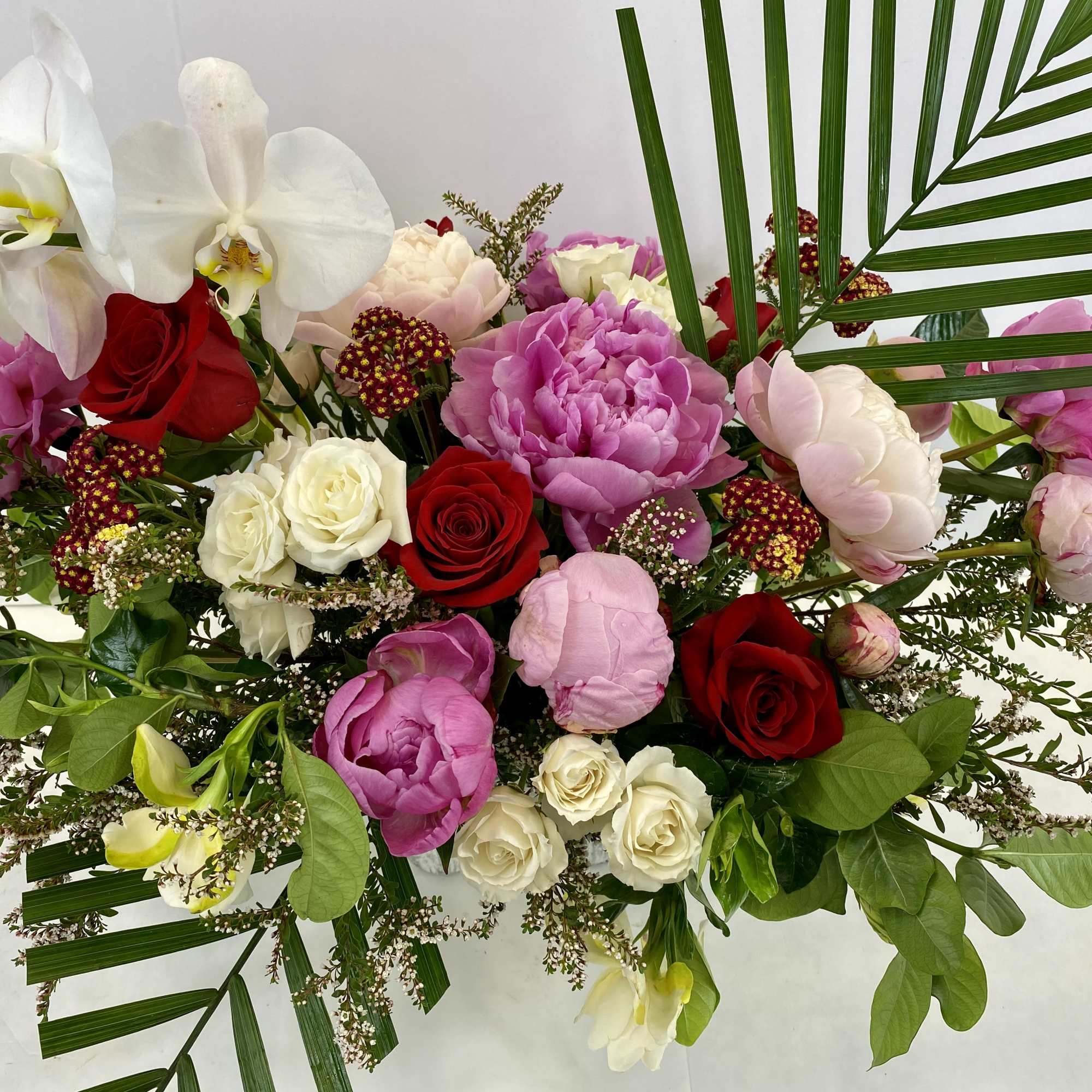 Spectacular modern flower arrangement to impress. Peonies or garden roses, roses, elegant