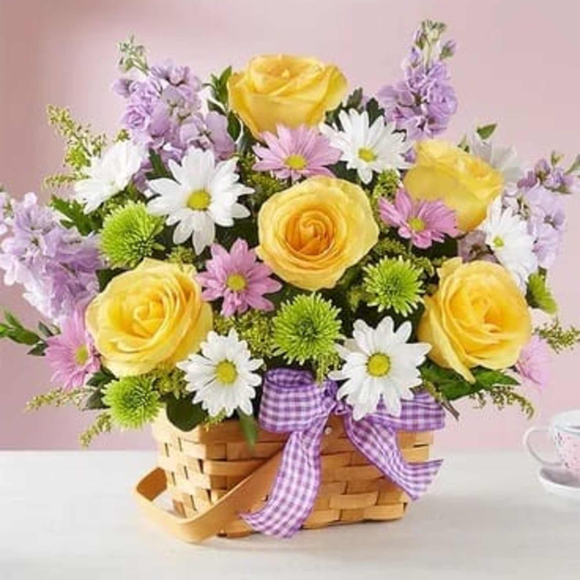 Bright, sunny springtime wishes are best sent with our charming basket arrangement. Bright, sunny springtime wishes are best sent with our charming basket arrangement.