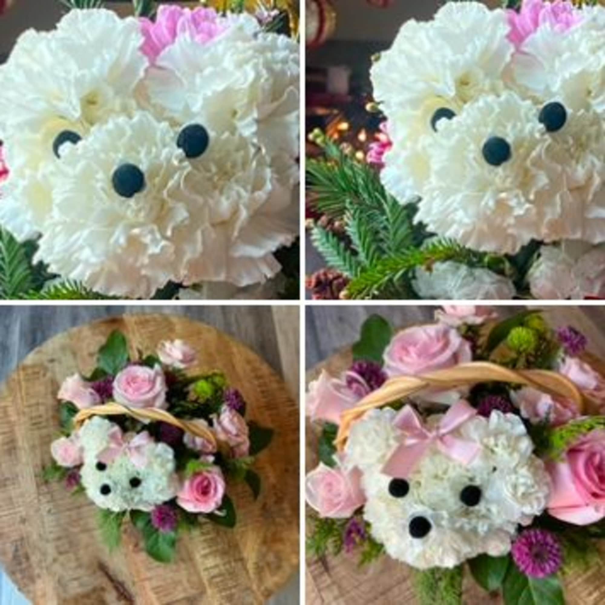 Fine and cute arrangement, on a Basket, forming a cute little puppy