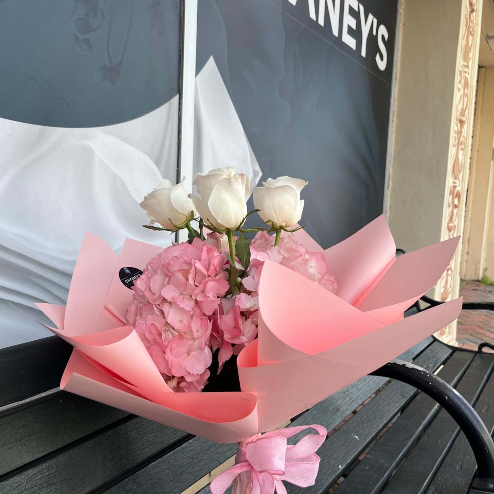 Pretty light pink wrap arranged with roses and hydrangeas. A perfect gift Pretty light pink wrap arranged with roses and hydrangeas. A perfect gift