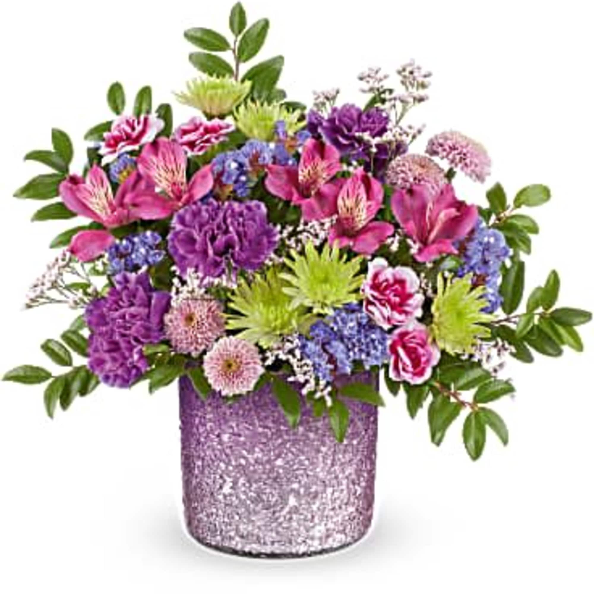 Win Mom&#039;s heart with Teleflora&#039;s Radiant Reverie cylinder, featuring a shimmering purple