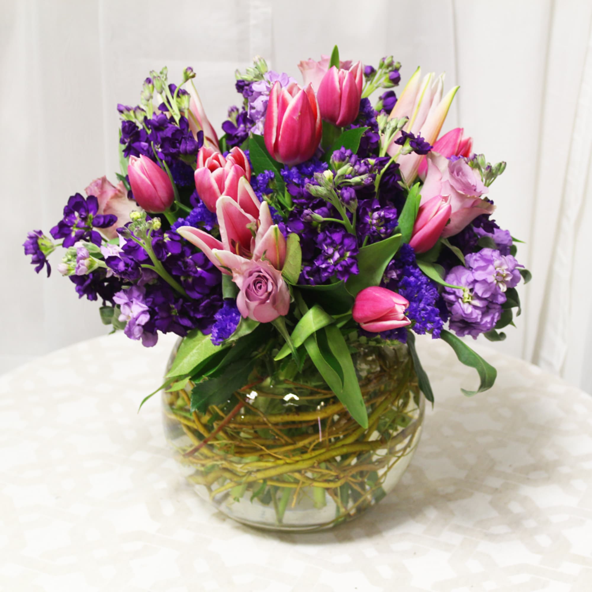 Shades of pink and violet bloom in this cute bubble bowl. Enchanting