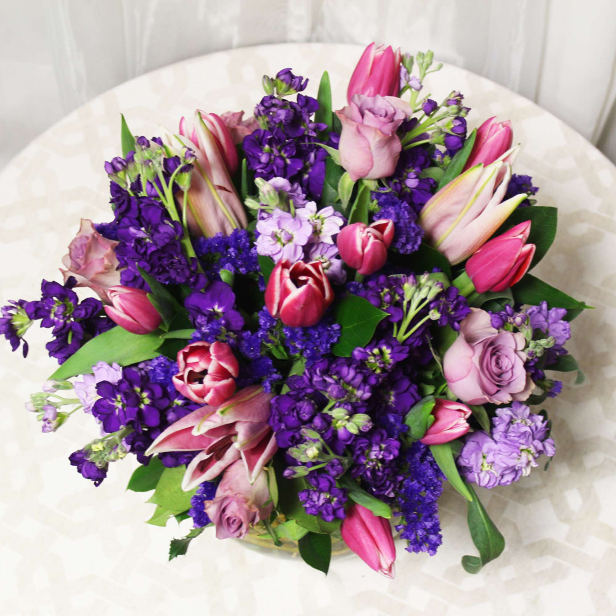 Shades of pink and violet bloom in this cute bubble bowl. Enchanting