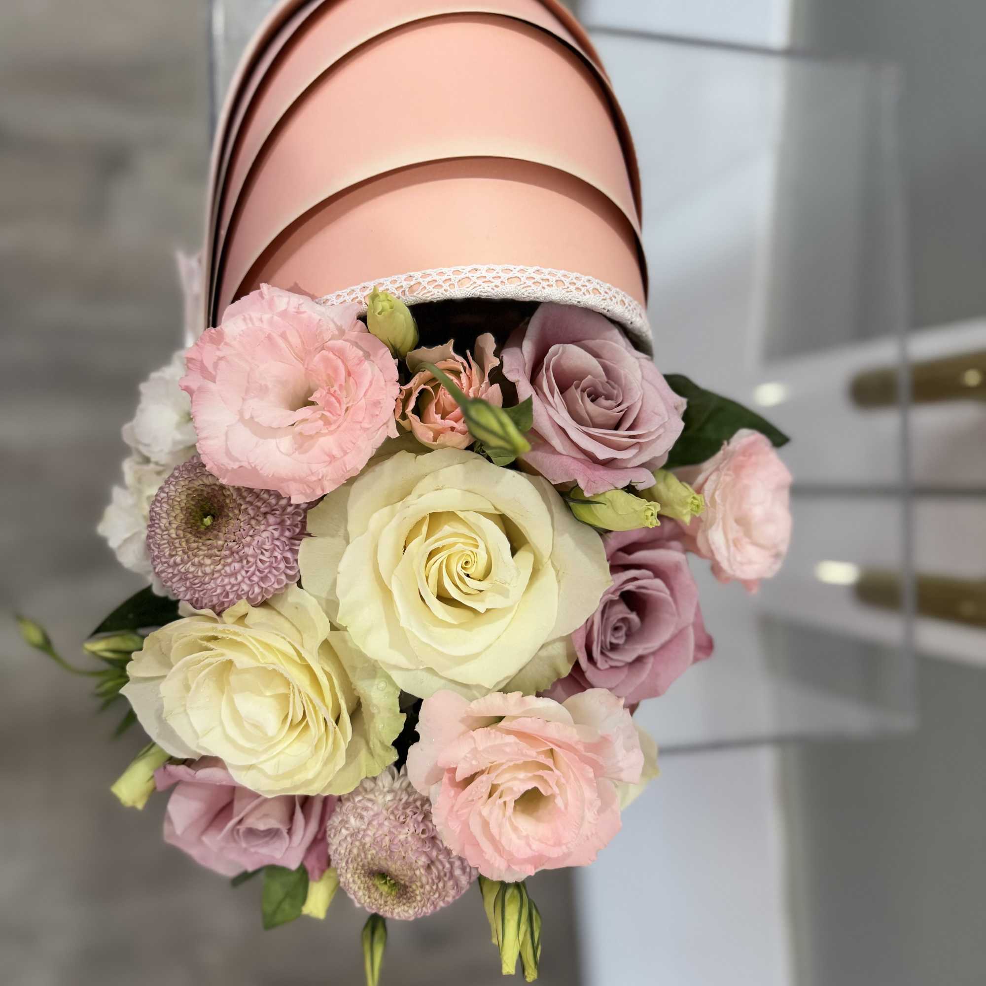 Premium floral designed in our signature carriage box with a personalized balloon