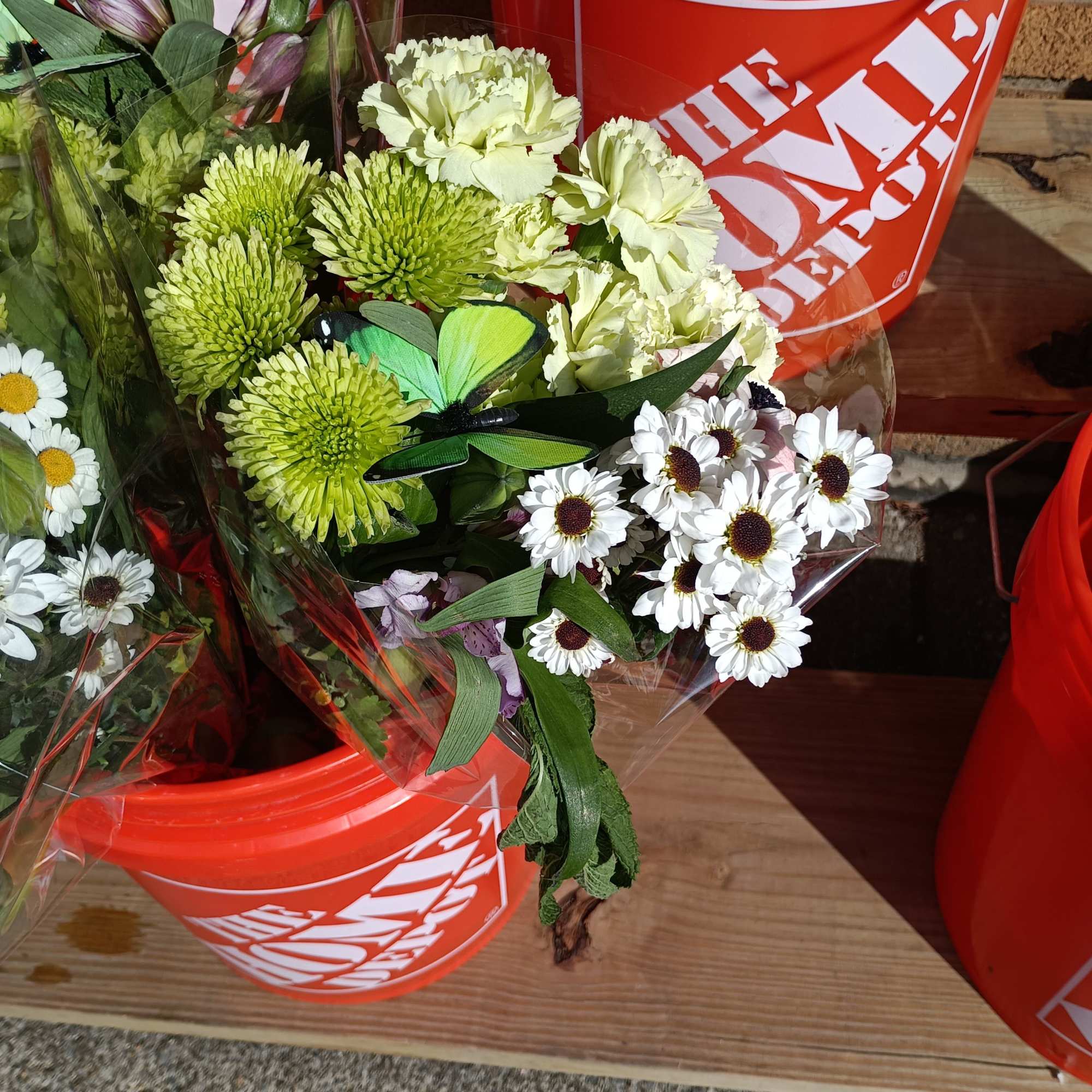 Beautiful green everything: carnations, white daisies, mint, roses and lilies with green