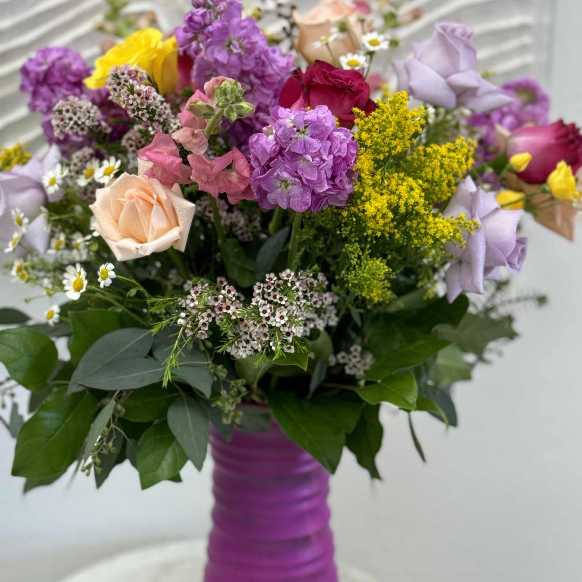 The arrangement in Romantic Pink style with freshest blooms of the day.