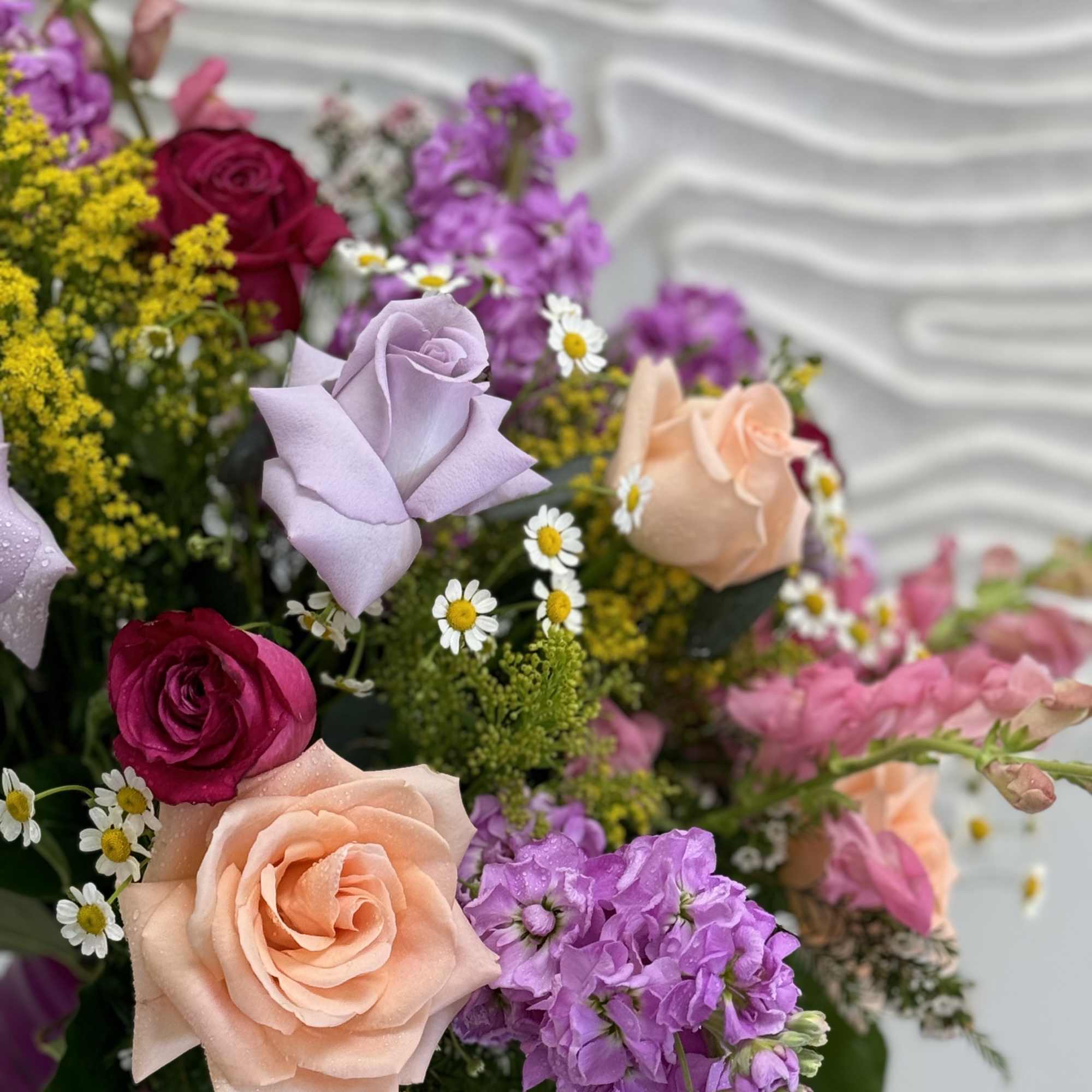 The arrangement in Romantic Pink style with freshest blooms of the day.