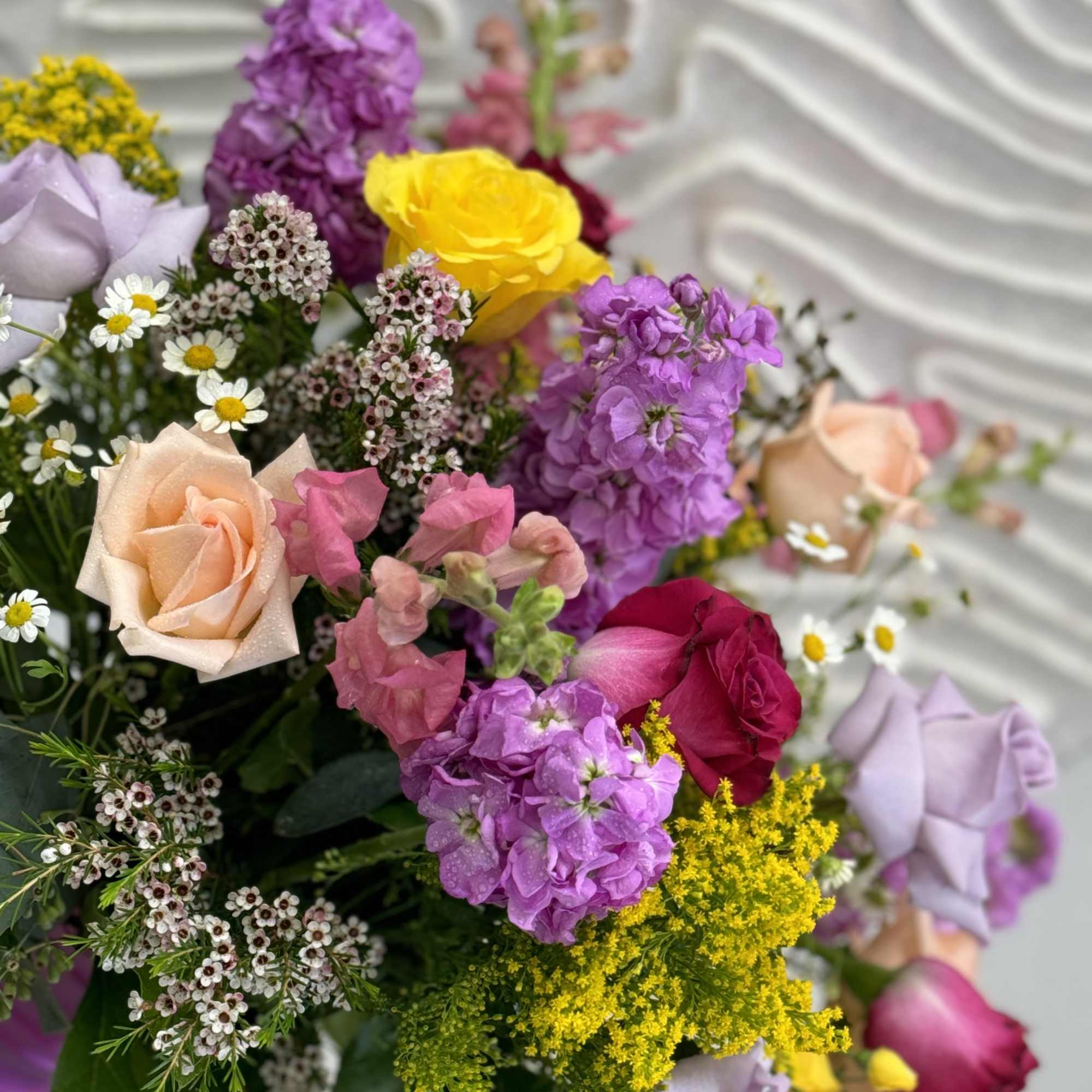 The arrangement in Romantic Pink style with freshest blooms of the day.