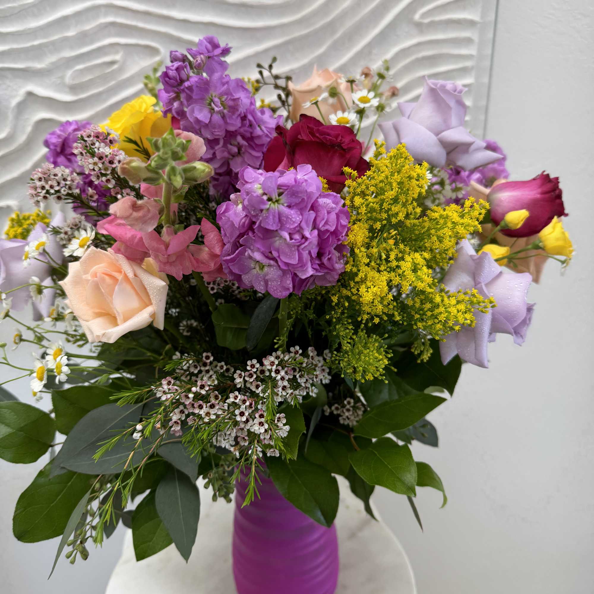 The arrangement in Romantic Pink style with freshest blooms of the day.
