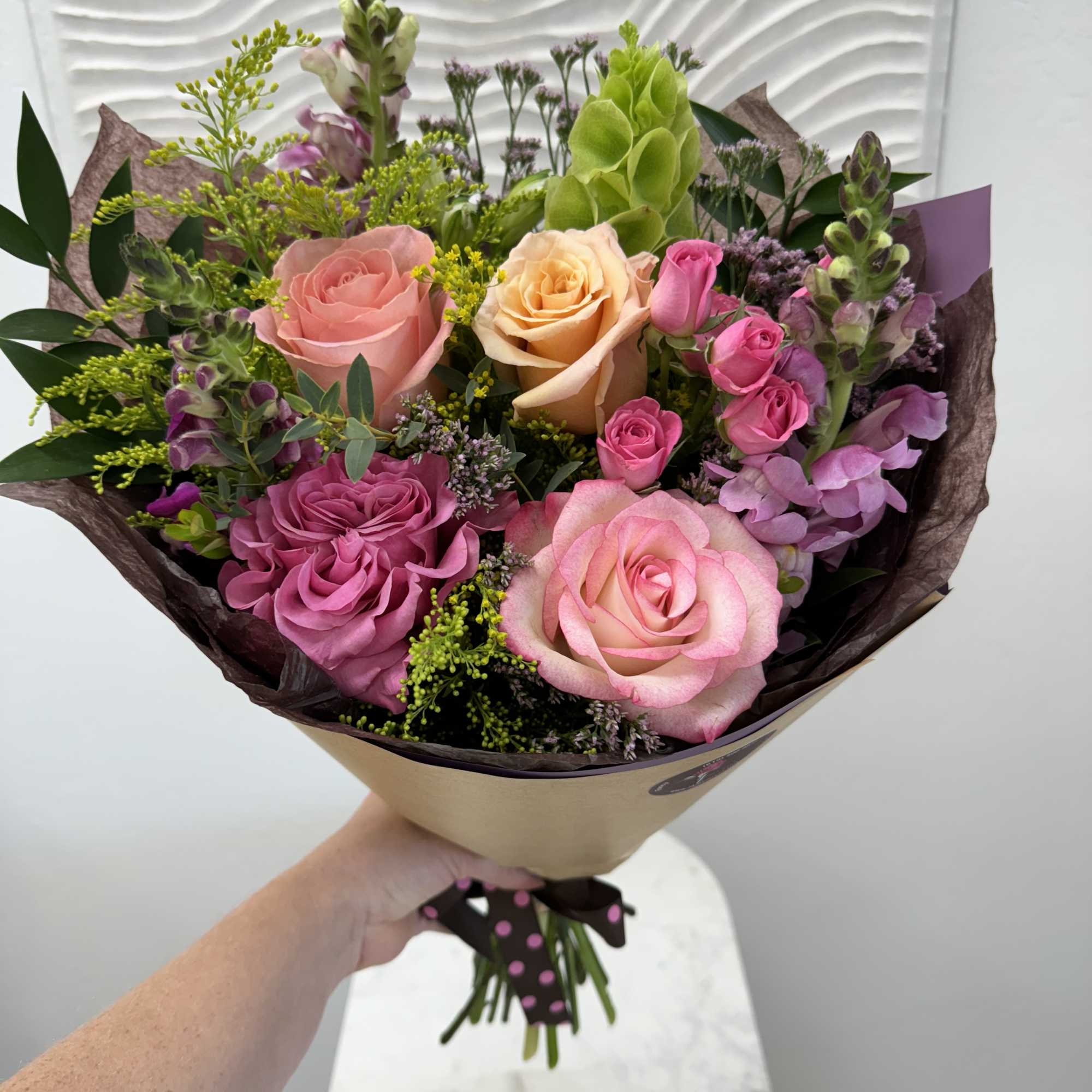 Wrapped Bouquet 100 is a versatile bouquet with freshest blooms of the