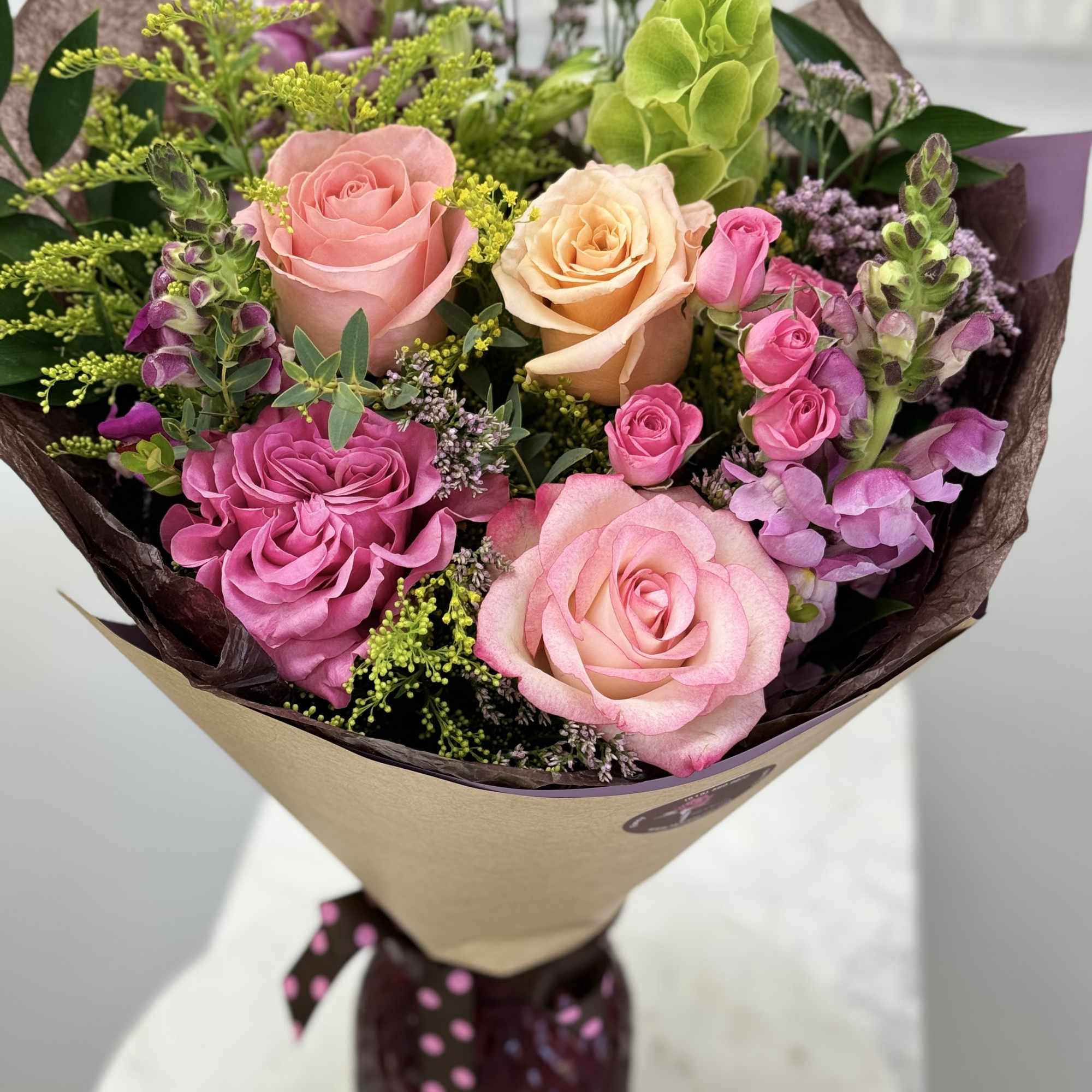Wrapped Bouquet 100 is a versatile bouquet with freshest blooms of the