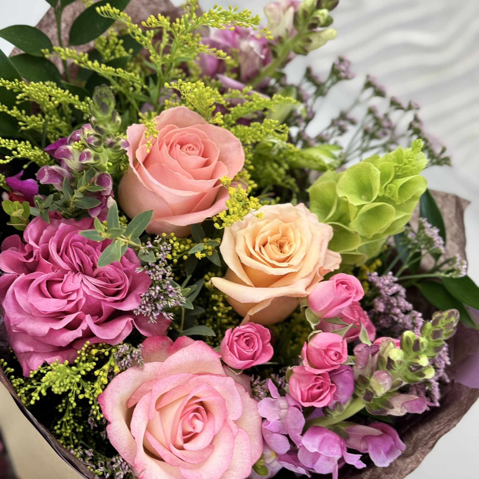 Wrapped Bouquet 100 is a versatile bouquet with freshest blooms of the