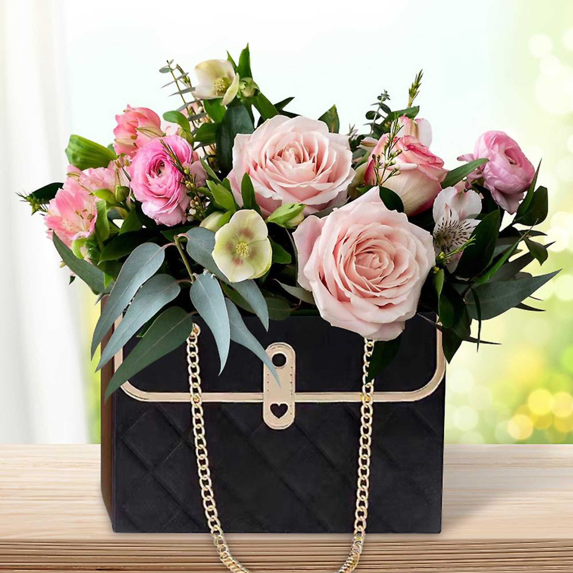 This chic and modern arrangement is designed in a multipurpose purse (paper
