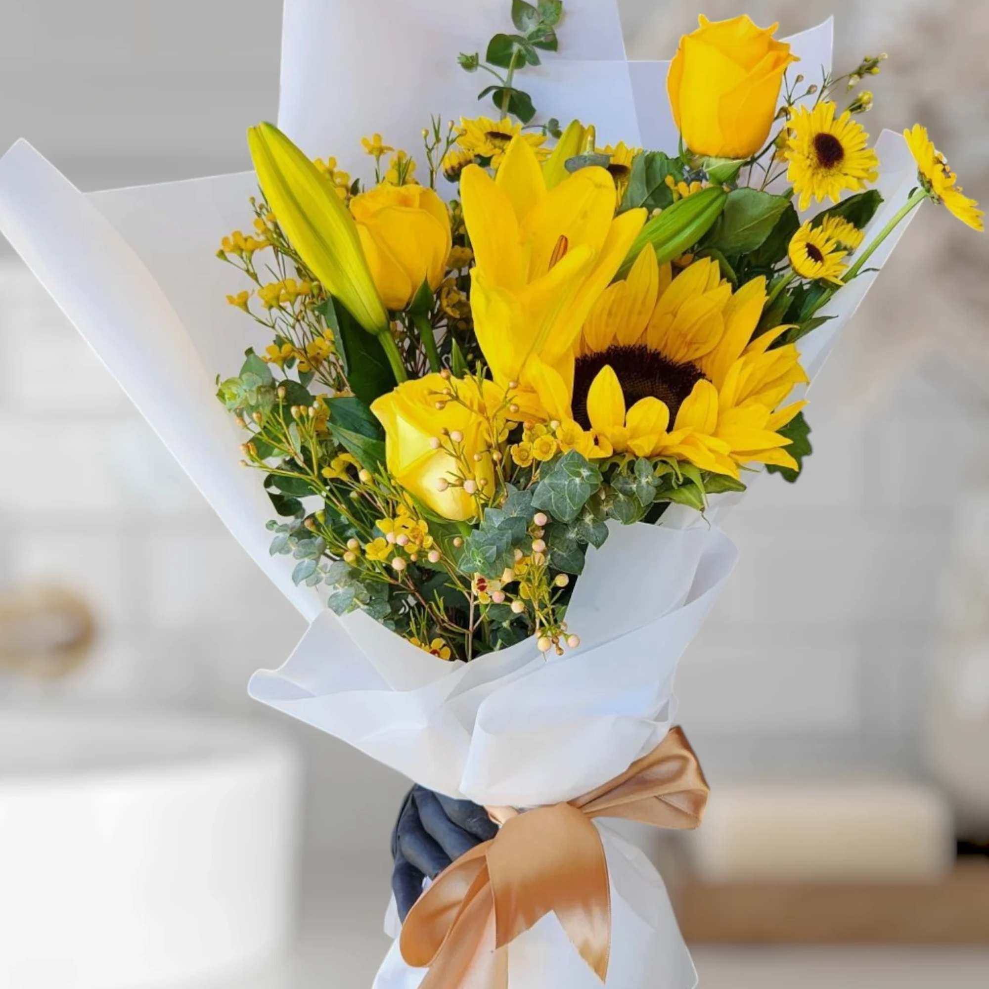 Yellow roses, sunflowers, Lilies and a variety of Yellow flowers. 
Yellow Flowers