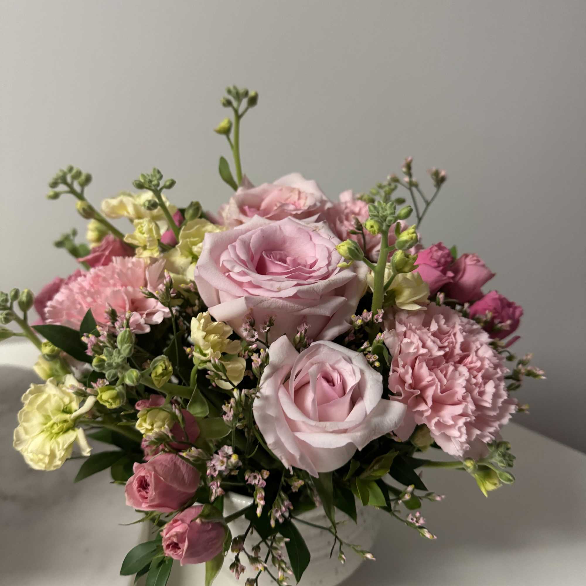 An arrangement of pink roses with fascinating and delicate details for a