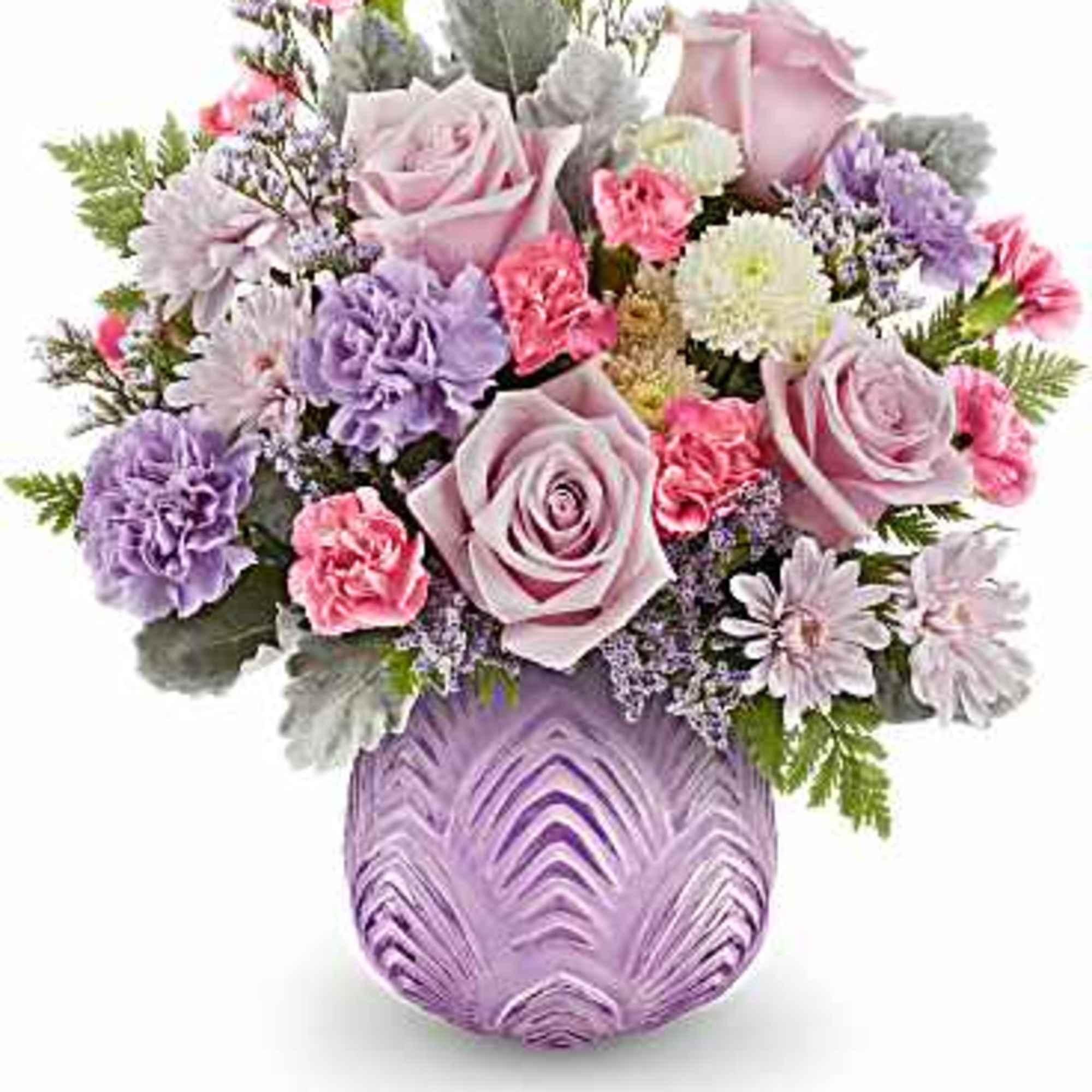 Dreamy blooms! This stylish bouquet, featuring delicate pinks and shimmering lavenders, looks