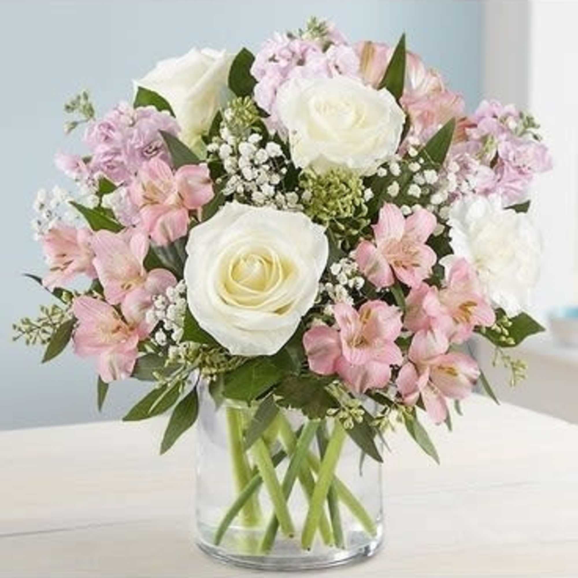 Our elegant bouquet in shades of blush pink and creamy white brings Our elegant bouquet in shades of blush pink and creamy white brings