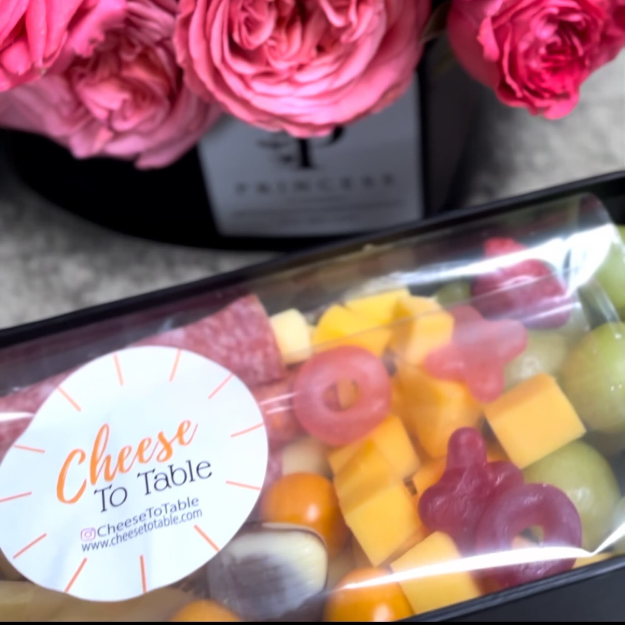 Blooms and charcuterie combination in collaboration with Cheese To Table! 
Presents as