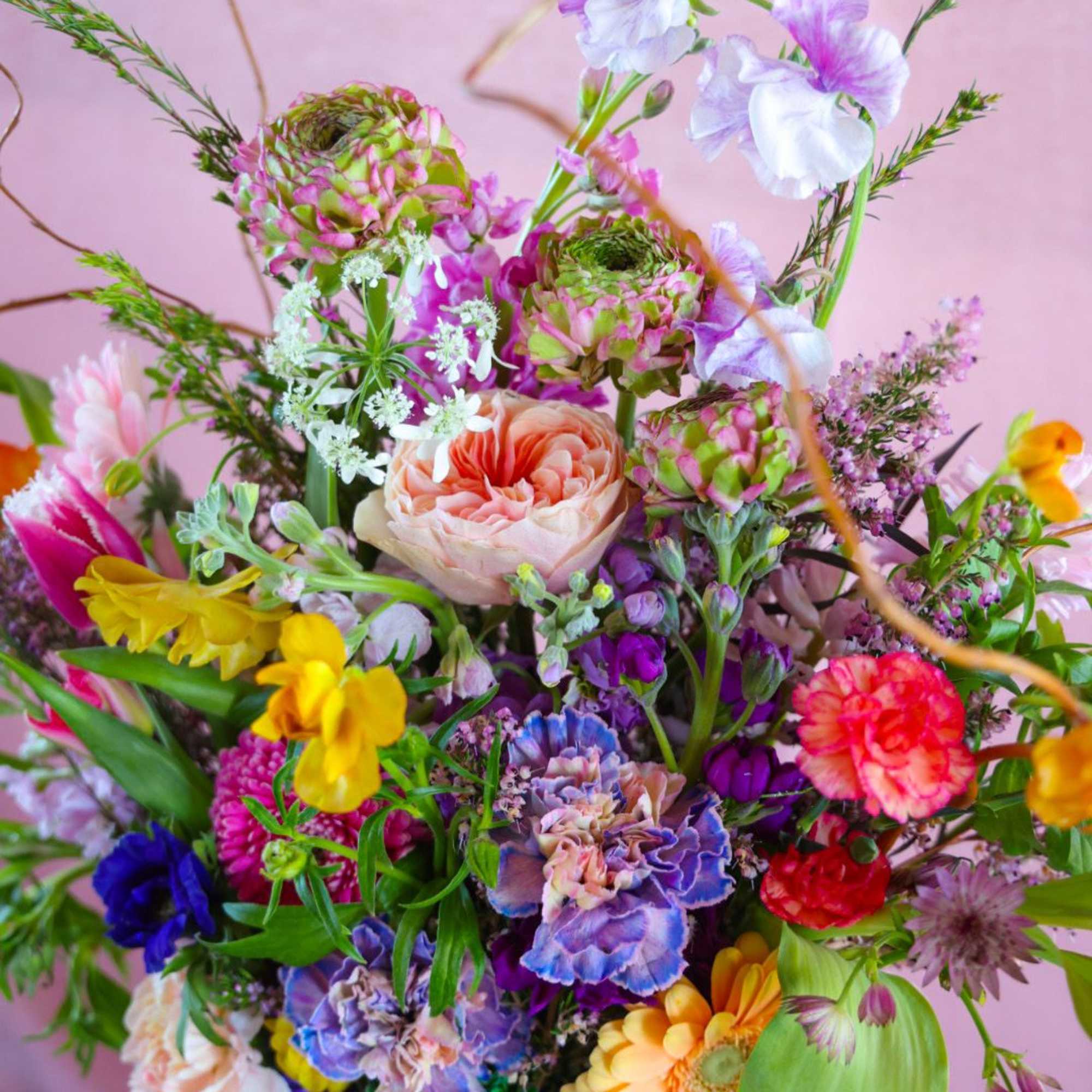 The Spring Dreams Arrangement is pure playful color, and exuberant excitement that
