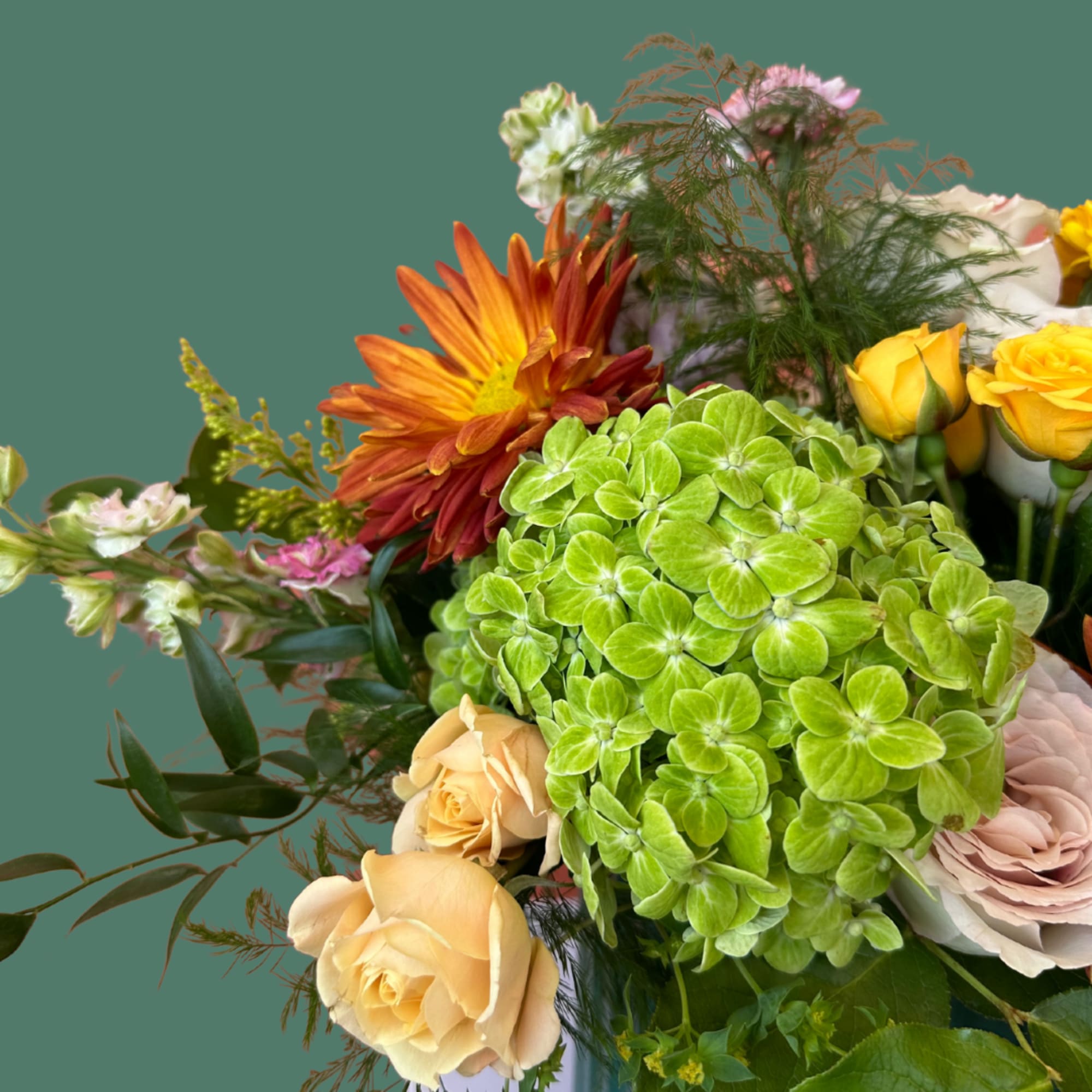 Whimsical and lush, The Flora is a garden-inspired arrangement that brings the