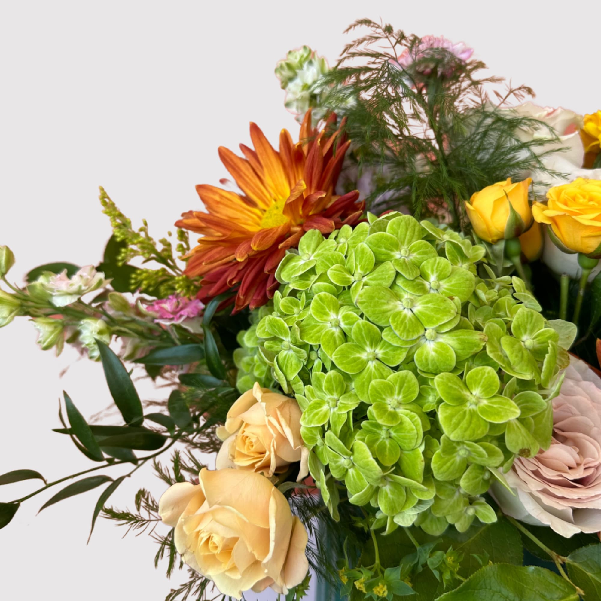 Whimsical and lush, The Flora is a garden-inspired arrangement that brings the
