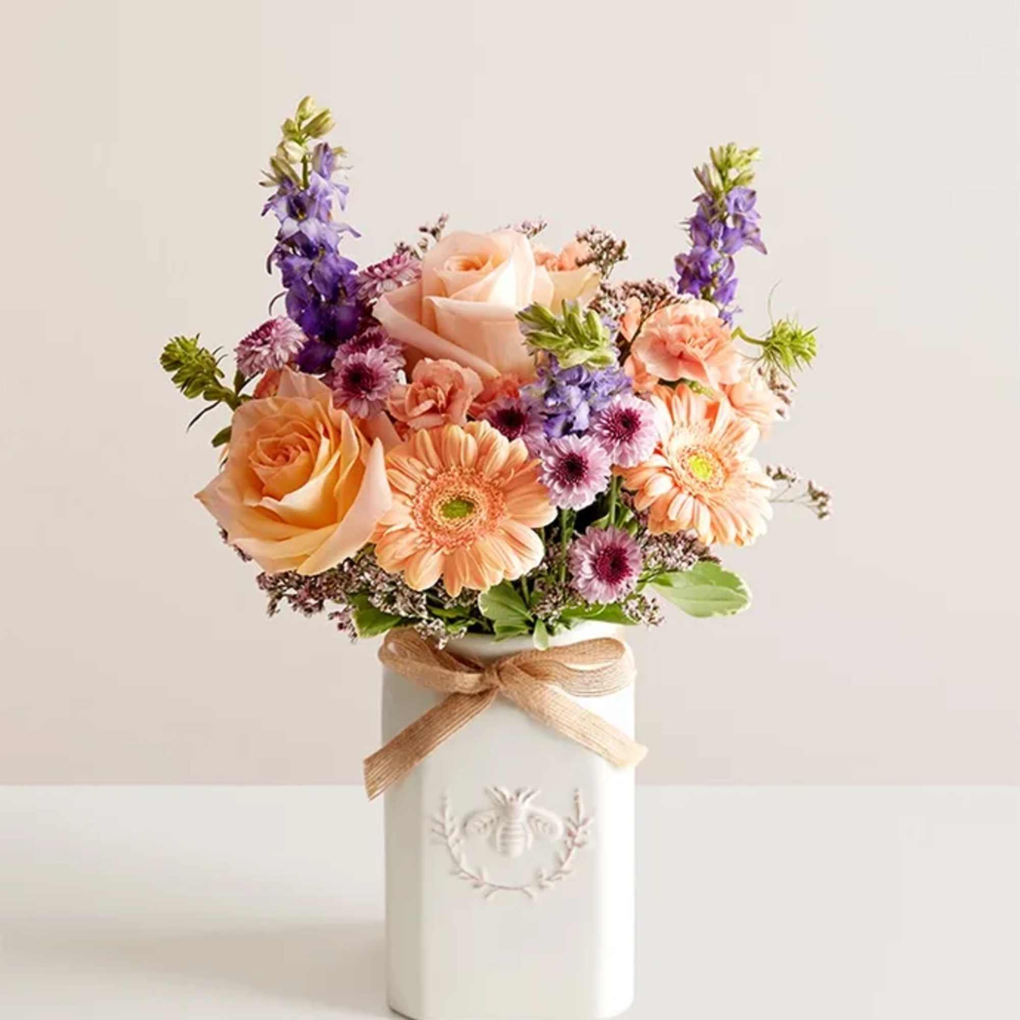 Get them buzzing with our charming bouquet! A garden-fresh gathering of blooms