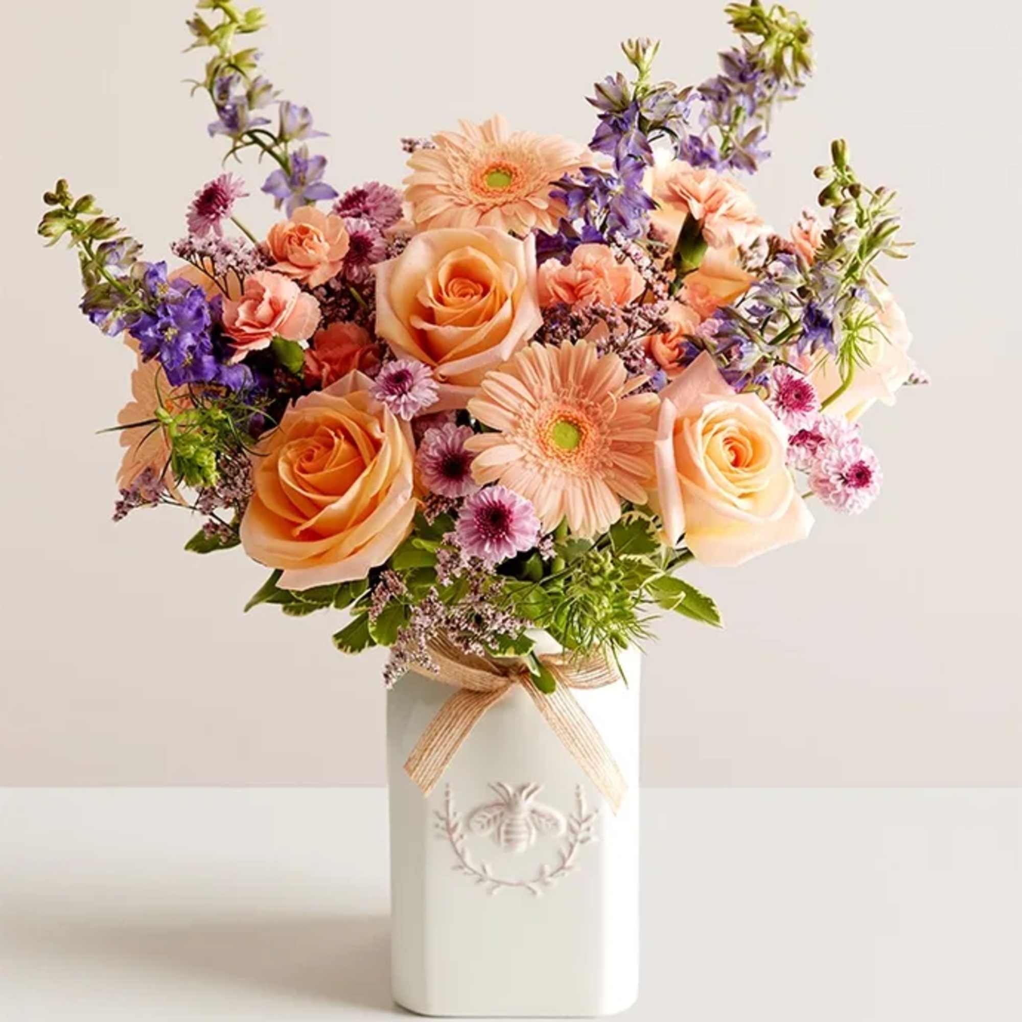 Get them buzzing with our charming bouquet! A garden-fresh gathering of blooms