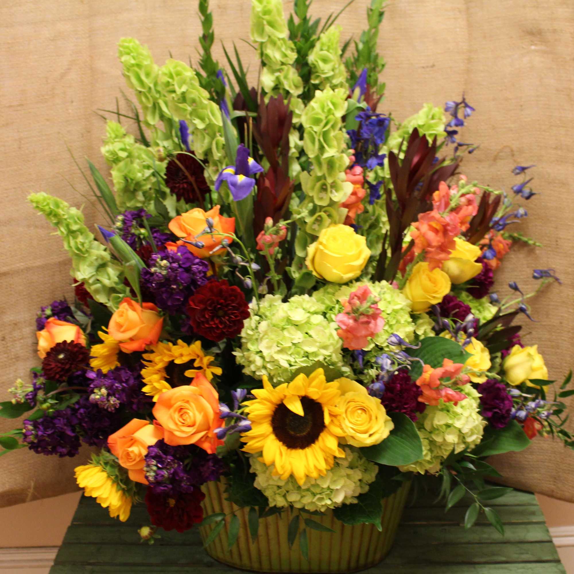 This green tub is filled with all of our favorite bright flowers This green tub is filled with all of our favorite bright flowers