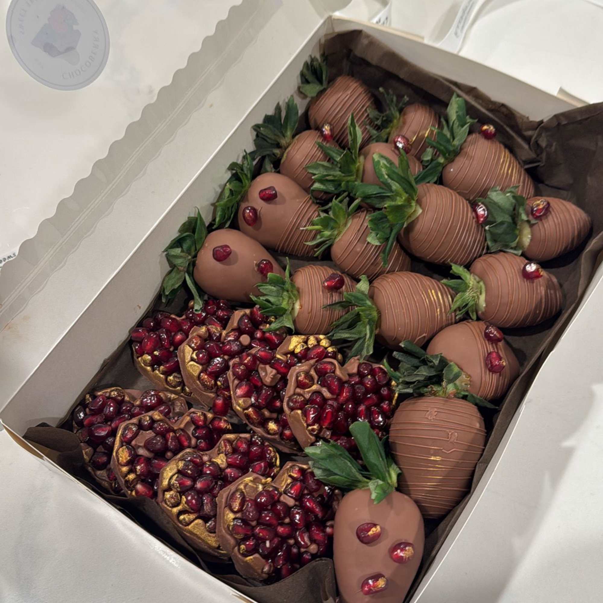 **Chocolate-Dipped Strawberries &amp; Pomegranate Chocolate Gift Box**  

Indulge in a luxurious