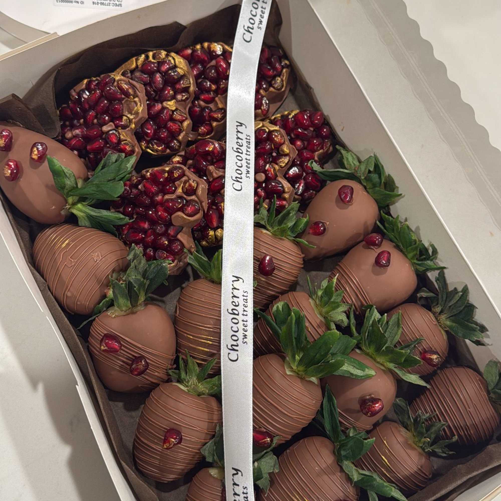 **Chocolate-Dipped Strawberries &amp; Pomegranate Chocolate Gift Box**  

Indulge in a luxurious