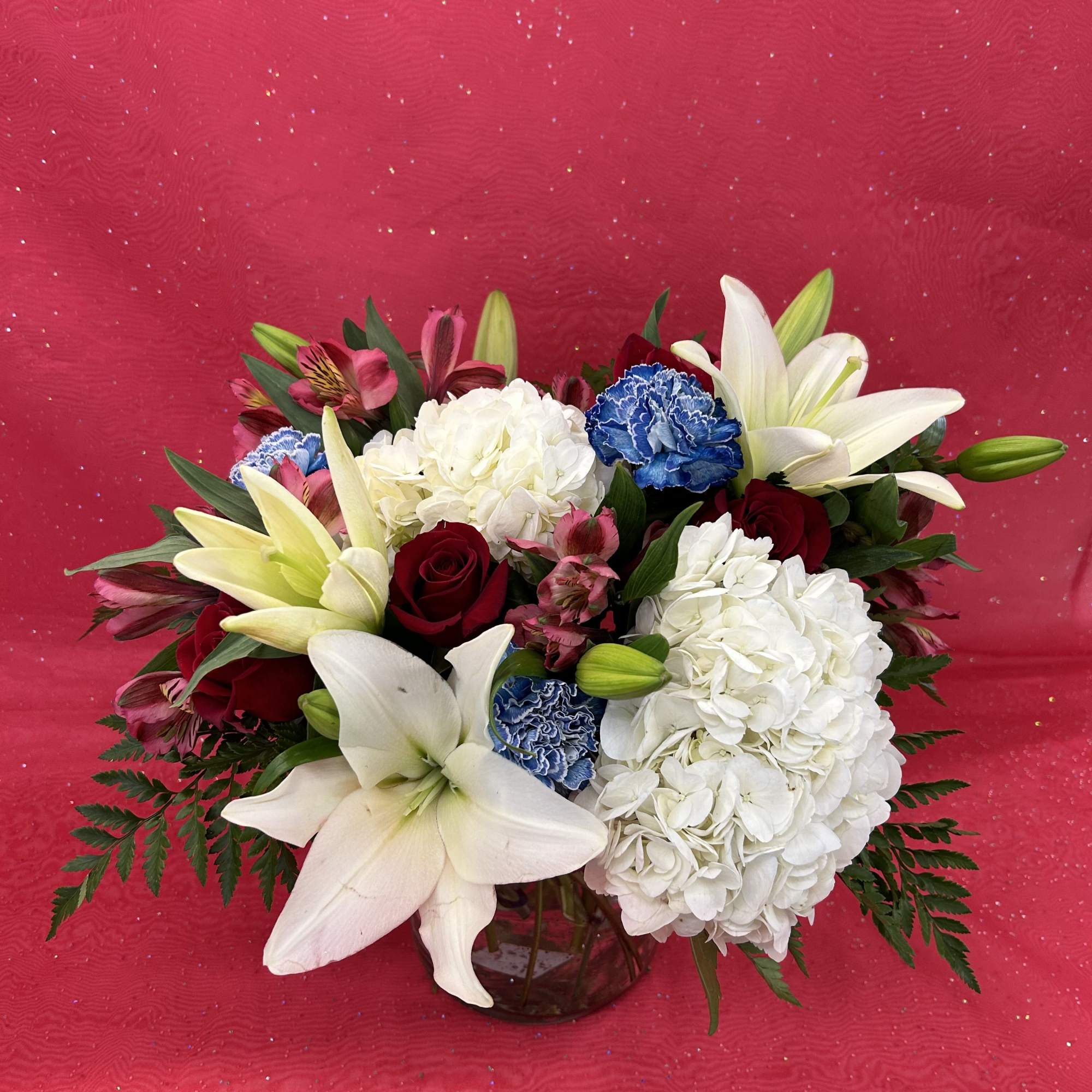 Get a beautiful arrangement with a mix of blue, pink and white Get a beautiful arrangement with a mix of blue, pink and white