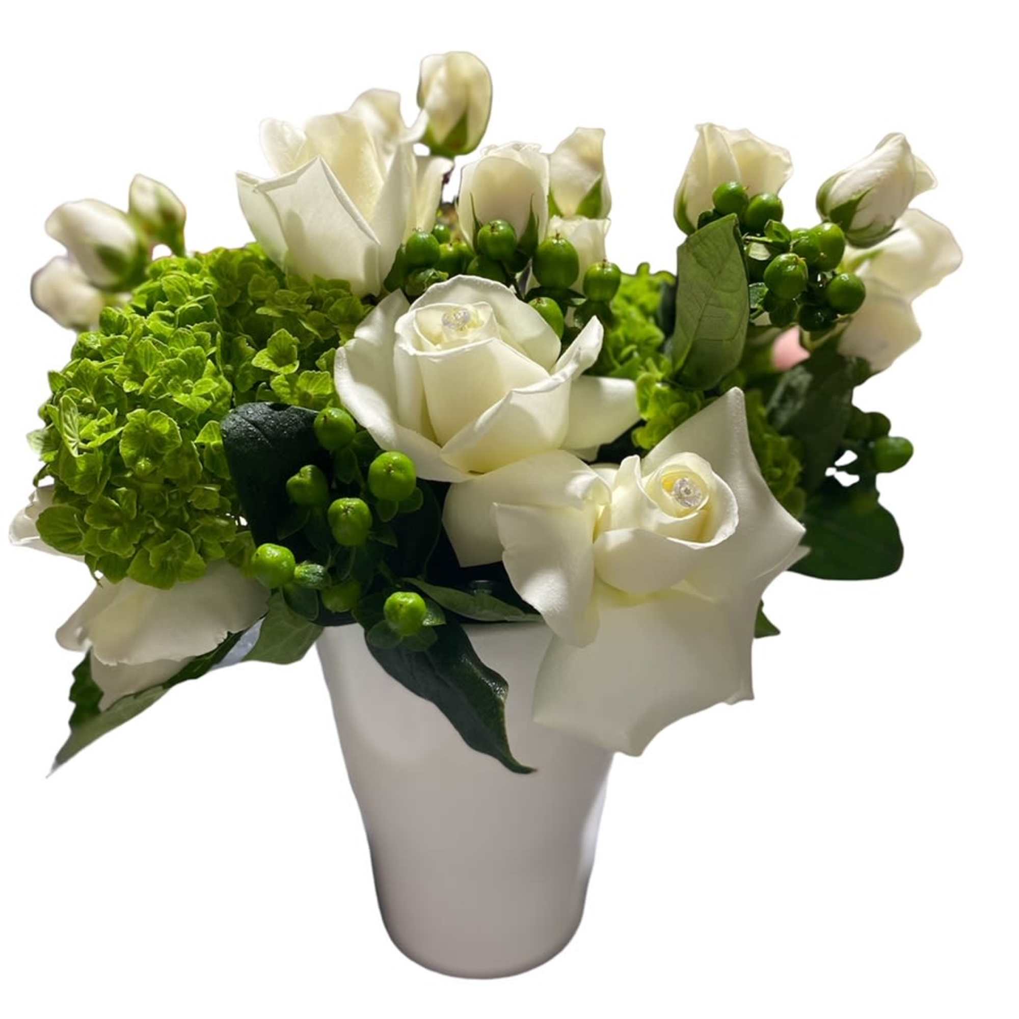 A premium designer&#039;s choice arrangement using season white flowers in short vase.